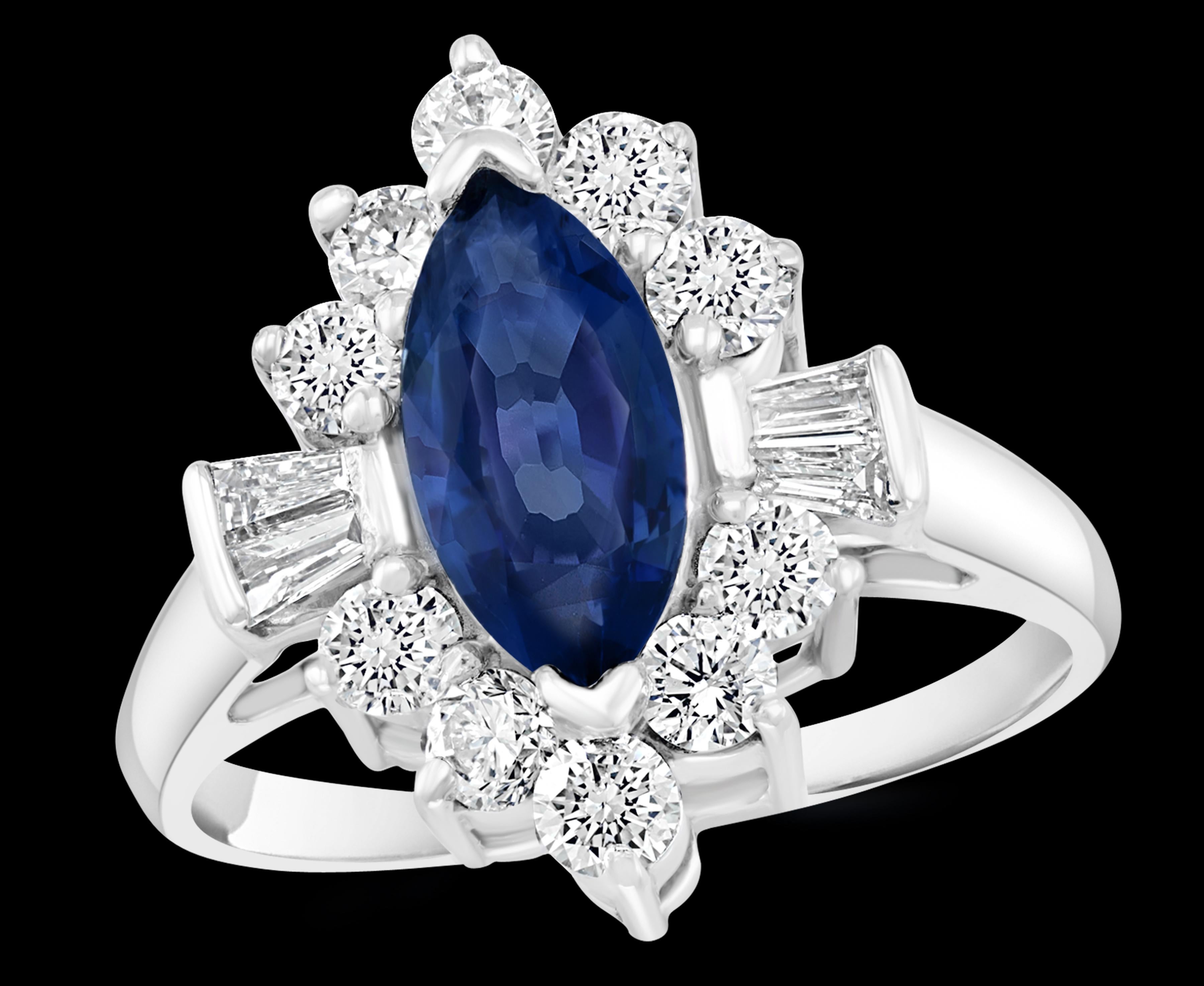 Approximately 2.5 Ct Blue Sapphire & Approximately 1.2 Ct Diamond Cocktail Ring in 18 Karat White Gold Estate
2.5 Carat of  Marquise shape blue Sapphire. This is an estate piece and stone was not taken  out to weigh the actual weight . 
10 Round