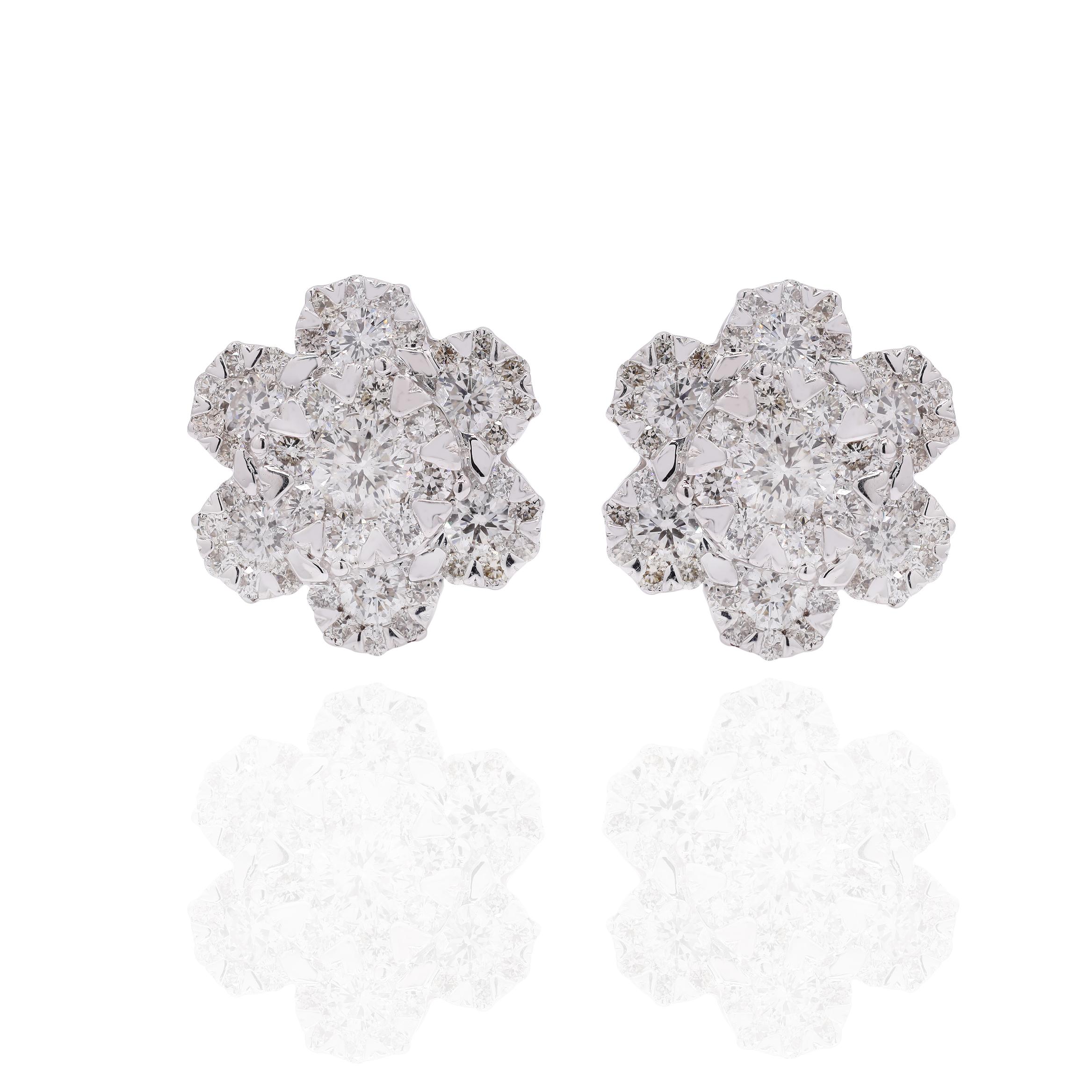 Earrings create a subtle beauty while showcasing the colors of the natural precious gemstones and illuminating diamonds making a statement.
Round cut Diamond Stud earrings in 18K gold. Embrace your look with these stunning pair of earrings suitable