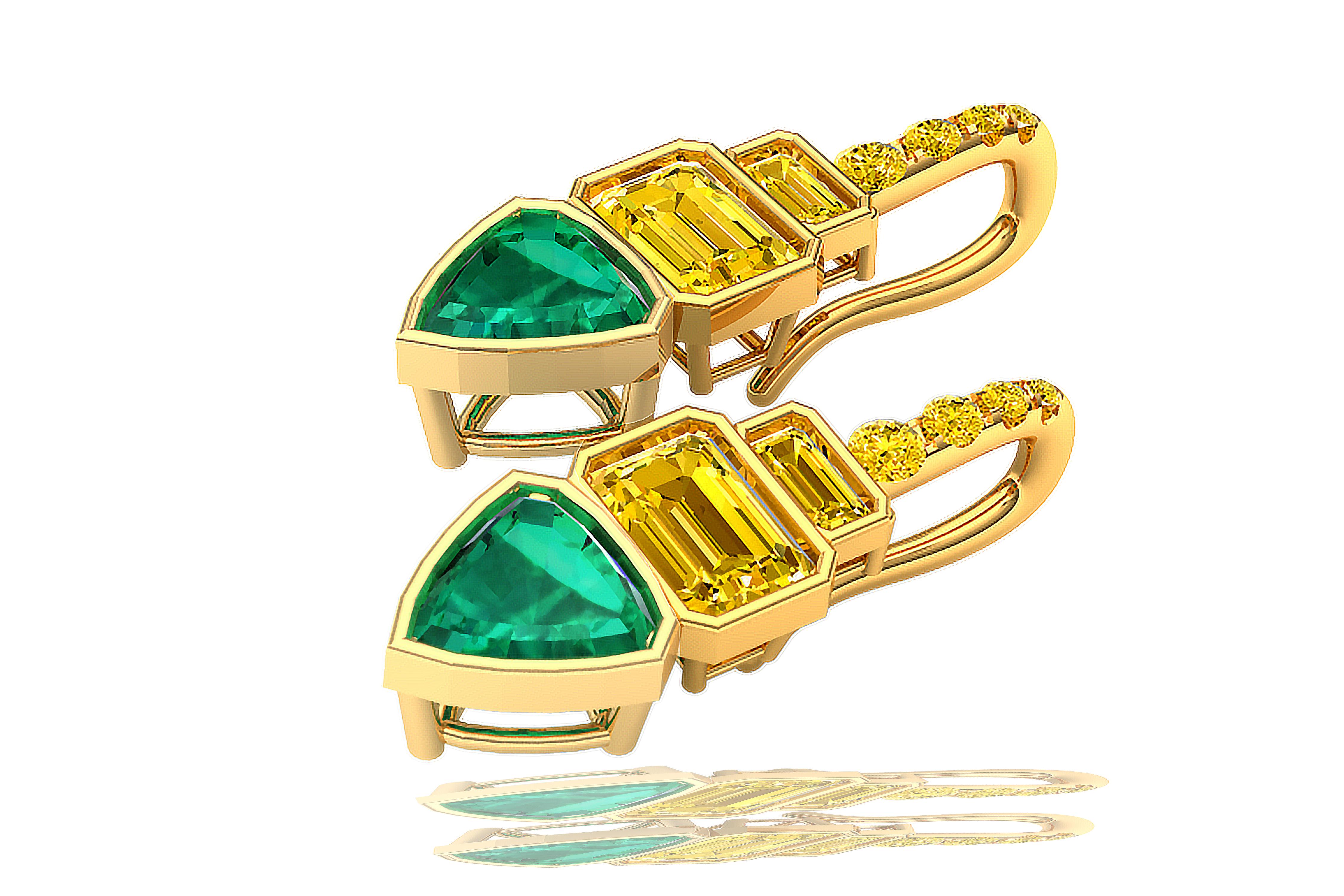 A stunning pair of rare and vivid yellow diamond earrings can be seen here.  The drop earrings are made of trillion cut emeralds that have a rich green color and are eye clean.  The emeralds weigh between .65 to .85 carats each.  The emeralds are