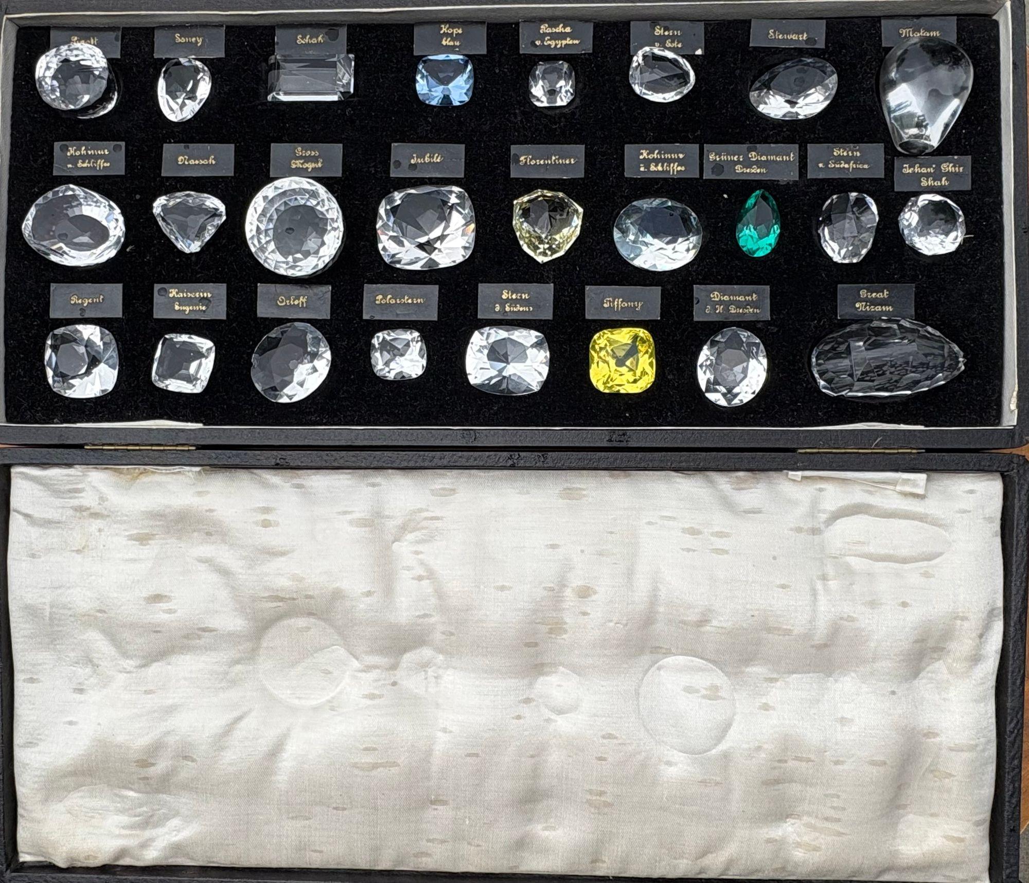 Collection of 25 Glass Reproductions of Historical Diamonds, In Leather Pad Case

A finely grouped collection of 25 Glass Reproductions of the Worlds most Famous Historical Diamonds some of which include the Hope Diamond, Polar Star, Jubilee,