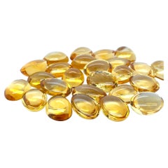 25 oval geformte Citrin-Cabochons in Cabochonform, Karat 334.95
