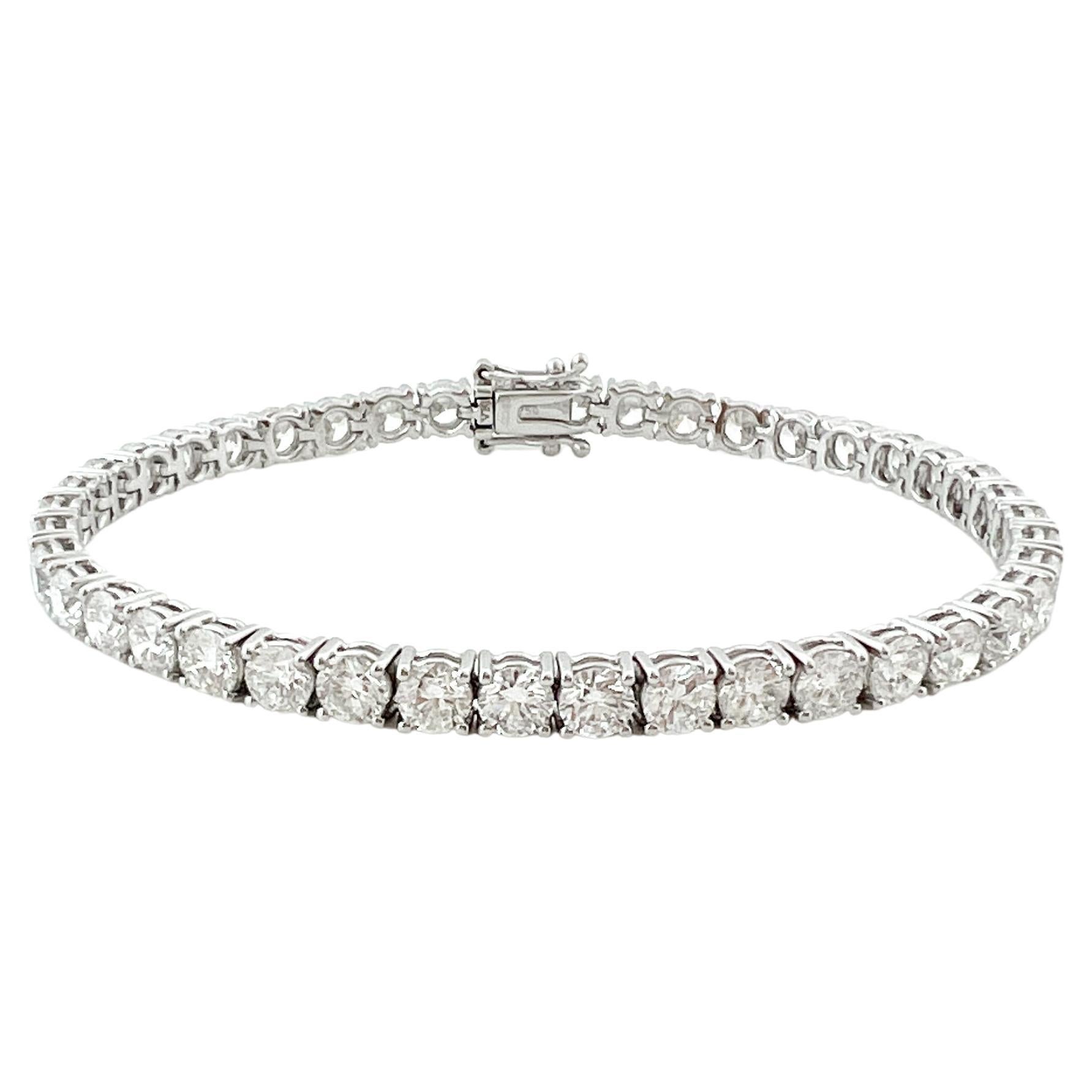 Classic Tennis Bracelet. 
Each Diamond is 25 points, 3.95-4mm in size.
Super bright E/F/G colour and stunning VS clarity.

Minimum total carat weight 10.00ct.
Bracelet length is 6.5 inches , if you require a different length please contact us for an