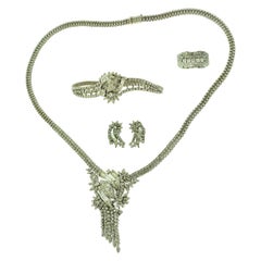 25 TCW Large Round and Baguette Diamond Four Piece Cocktail Set in White Gold 25 TCW Large Round and Baguette Diamond Four Piece Cocktail Set in White Gold