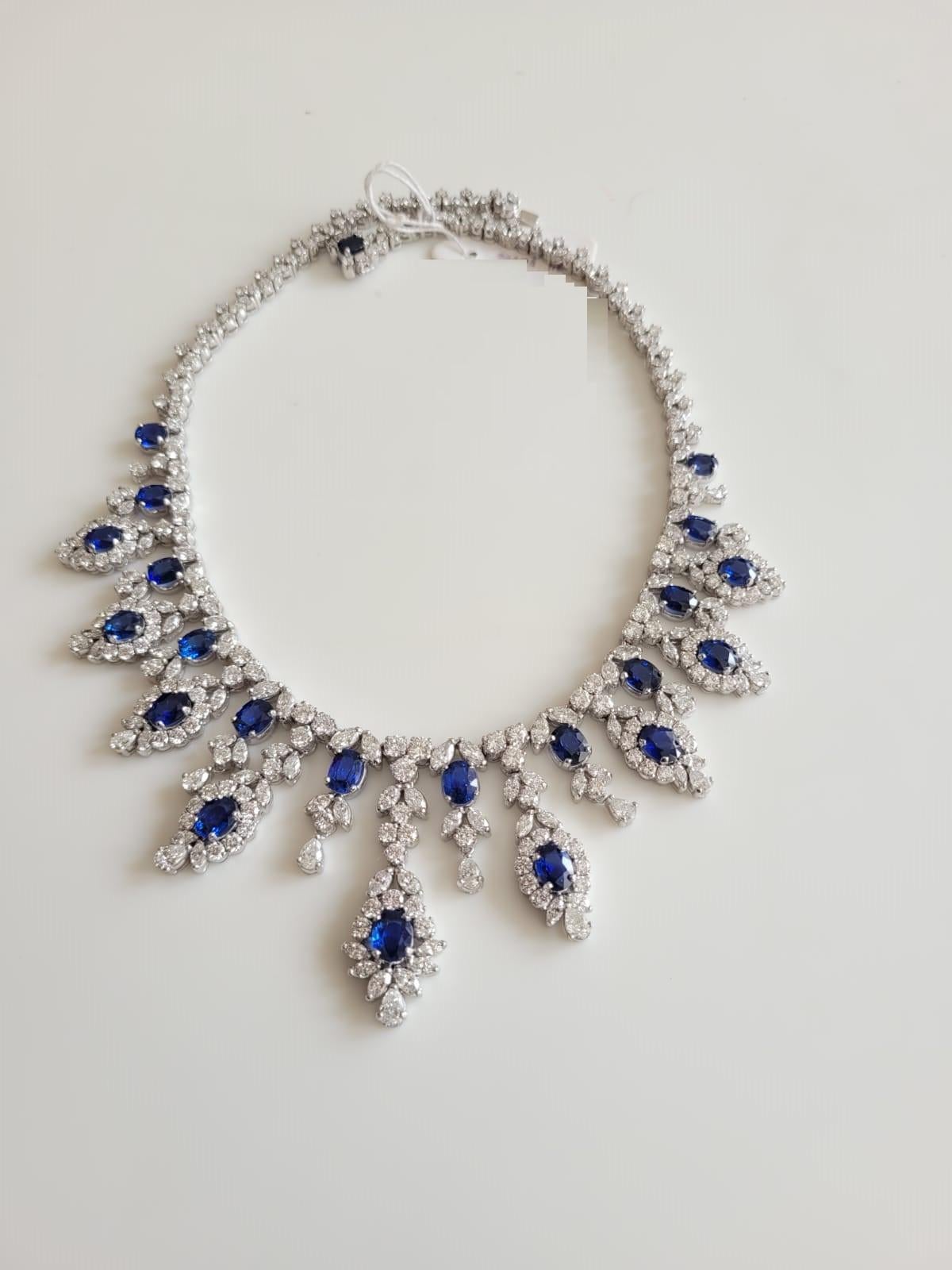 A Rare 18KT White Gold Estate Ceylon Sapphire Diamond Necklace. Necklace is comprised of Finely Set Glittering Gorgeous Ceylon Sapphire Necklace and adorned with Sparkling Round Diamonds!! T.C.W. approx 52CTS!!! Original Price $250,000.00 and comes
