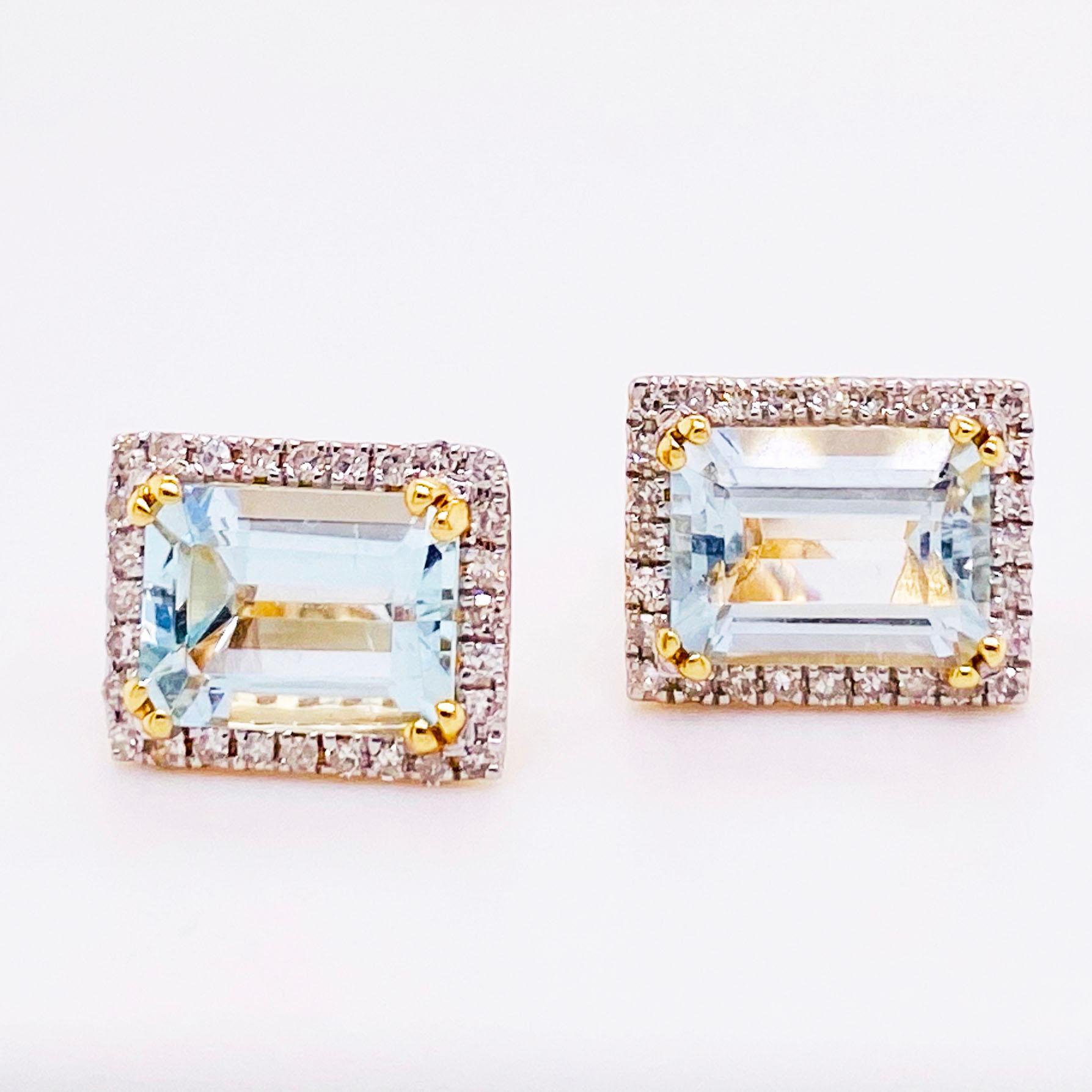 The blue topaz and diamond halo earrings are a modern design set in 14 karat yellow gold! Each earrings holds an emerald cut, genuine blue topaz gemstone set in four yellow gold prongs. The topaz measure 8 mm by 6 mm. The yellow gold contrasts with