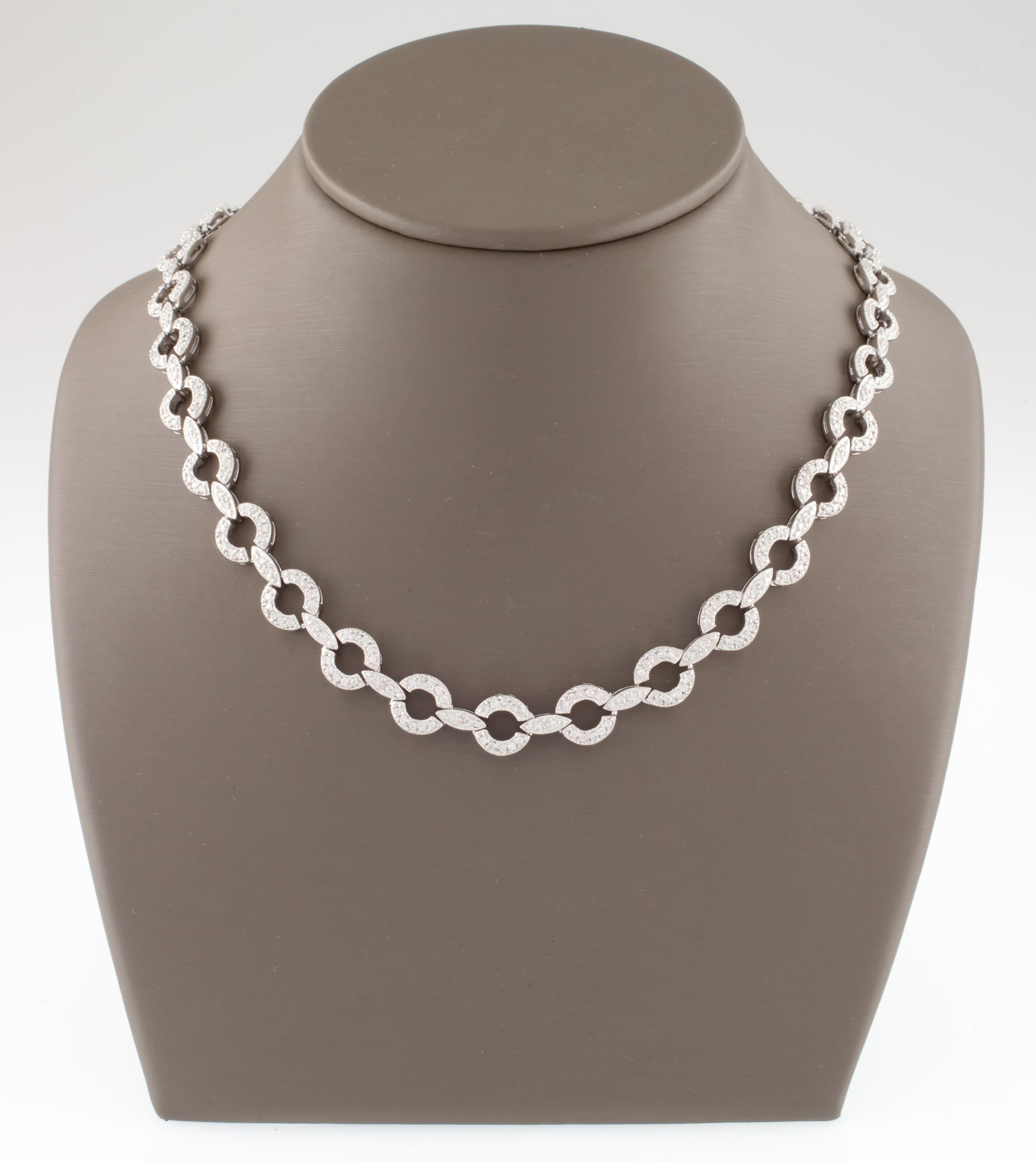 Gorgeous 14k White Gold Link Necklace
Each Necklace is a Loop set with Pave-Set Round Diamond
Loops Closer to Clasp smaller than loops in middle
Smaller Loops = Appx 7 mm in Diameter
Larger Loops = Appx 8.5 mm in Diameter
Total Length of Necklace =