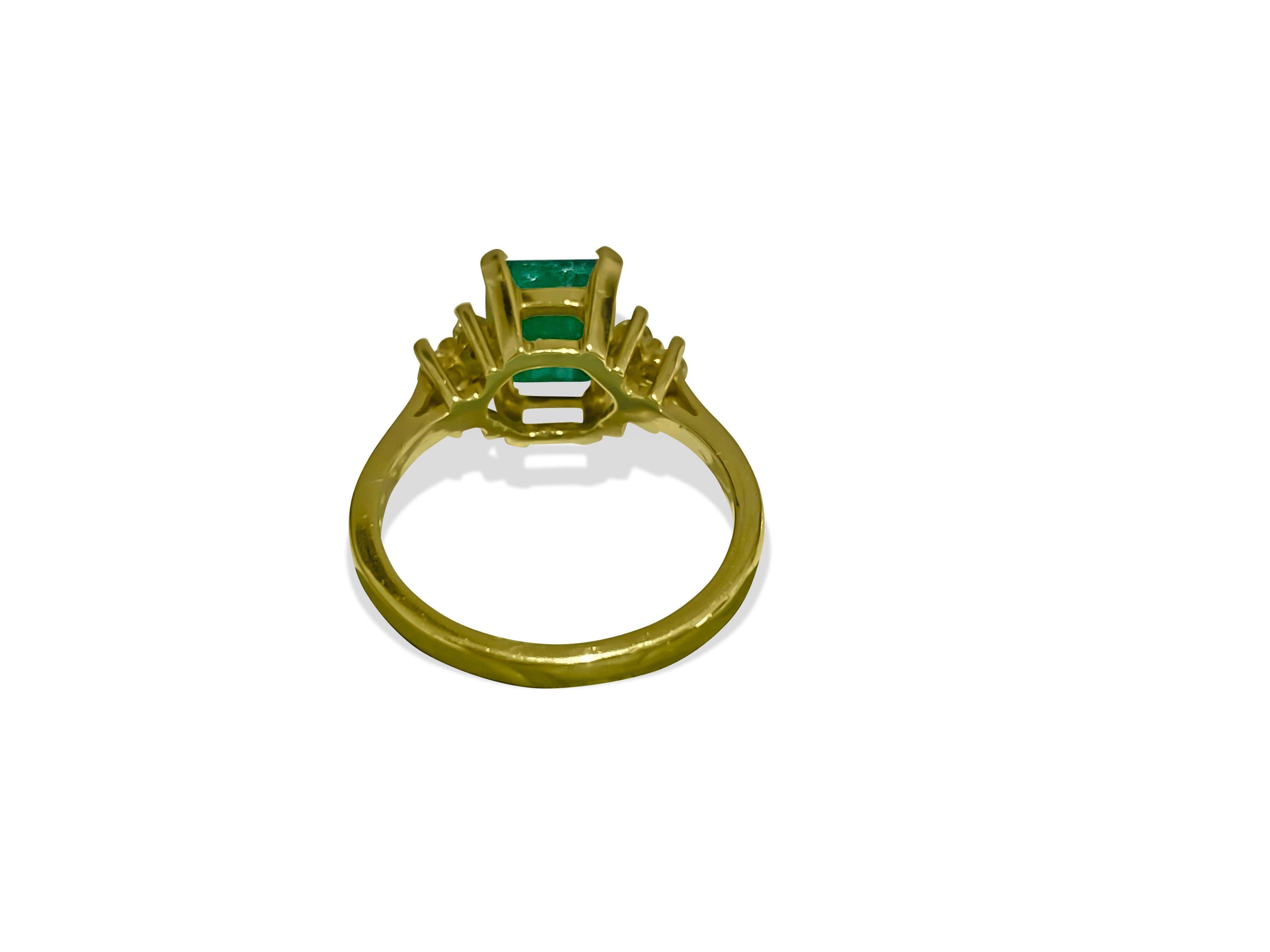 Crafted from luxurious 14K yellow gold, this stunning ring features a magnificent 2.50-carat princess-cut emerald, sourced directly from the earth for its natural beauty. Surrounding the emerald are dazzling round brilliant cut diamonds, boasting VS