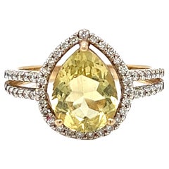 Bague en or jaune 14 carats avec béryl jaune doré de 2,50 carats et halo de diamants