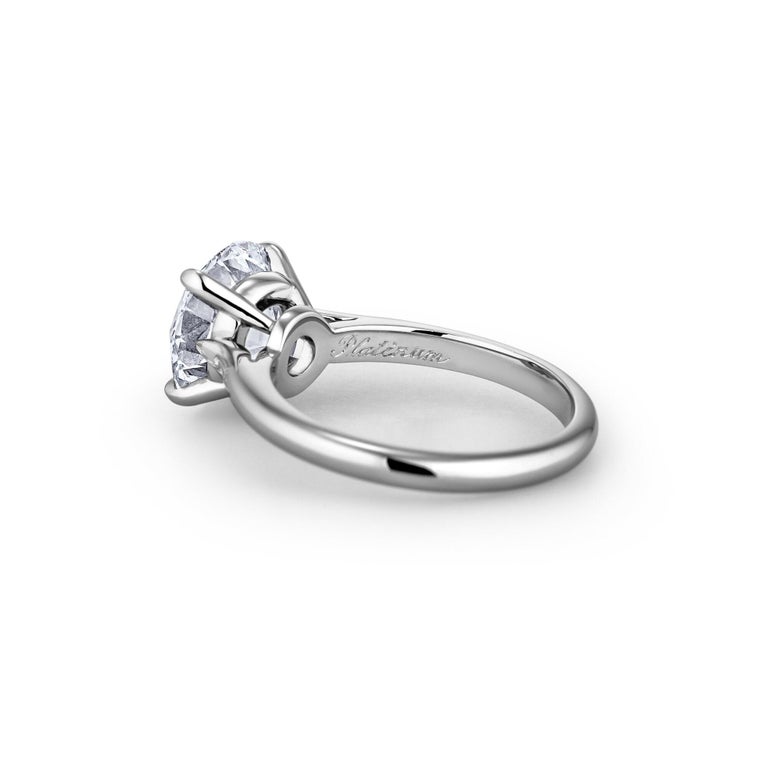 
The circle shape suggests infinite love, unity, and complete harmony with no end, and this 2.55 carat ideal cut round brilliant diamond engagement ring will bless the wearer with those priceless gifts. Graceful and feminine this extraordinary