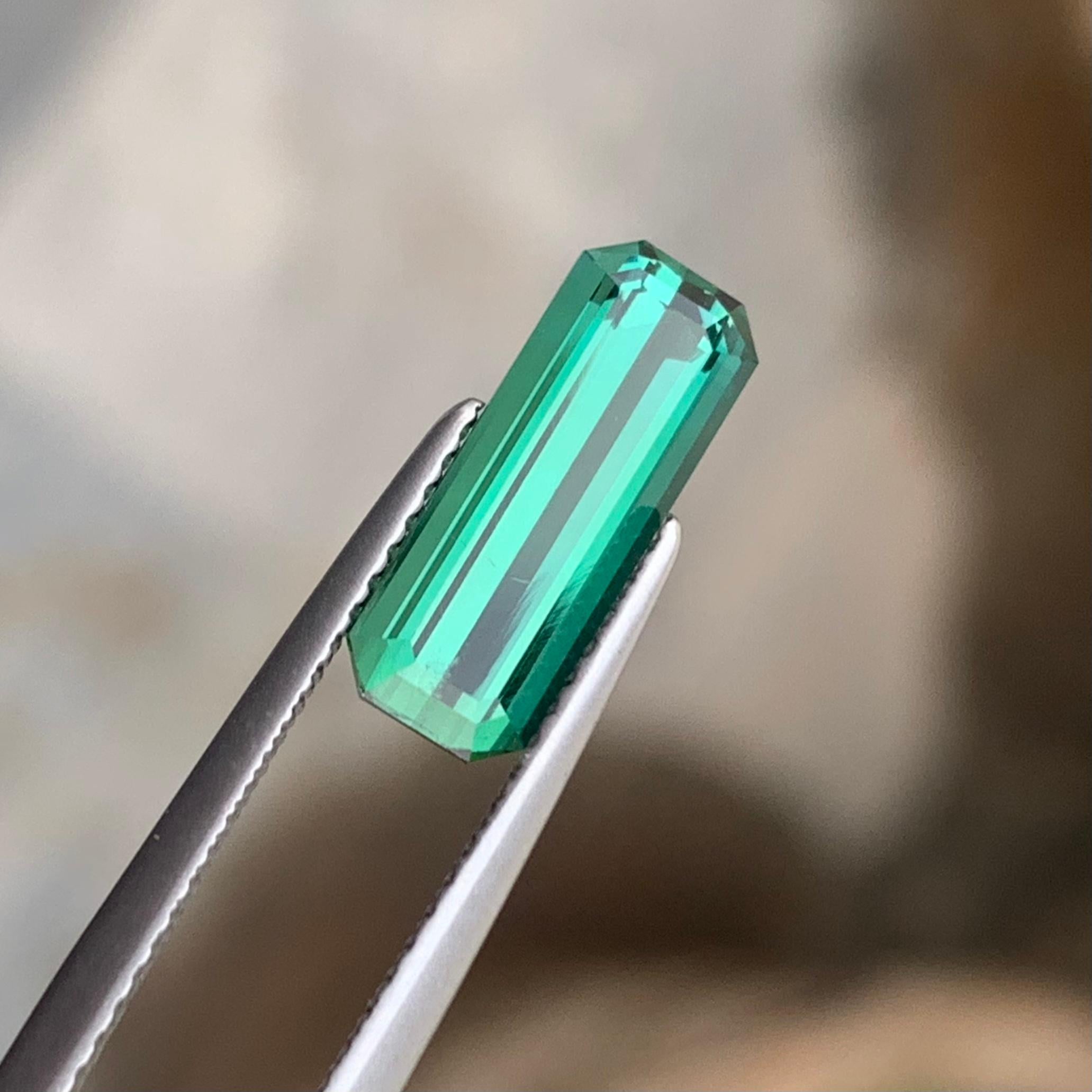 Women's or Men's 2.50 Carat Natural Emerald Cut Long Faceted Lagoon Tourmaline Gemstone For Sale