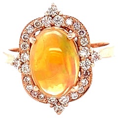 Bague en or jaune 2,50 carats opale naturelle diamant design antique