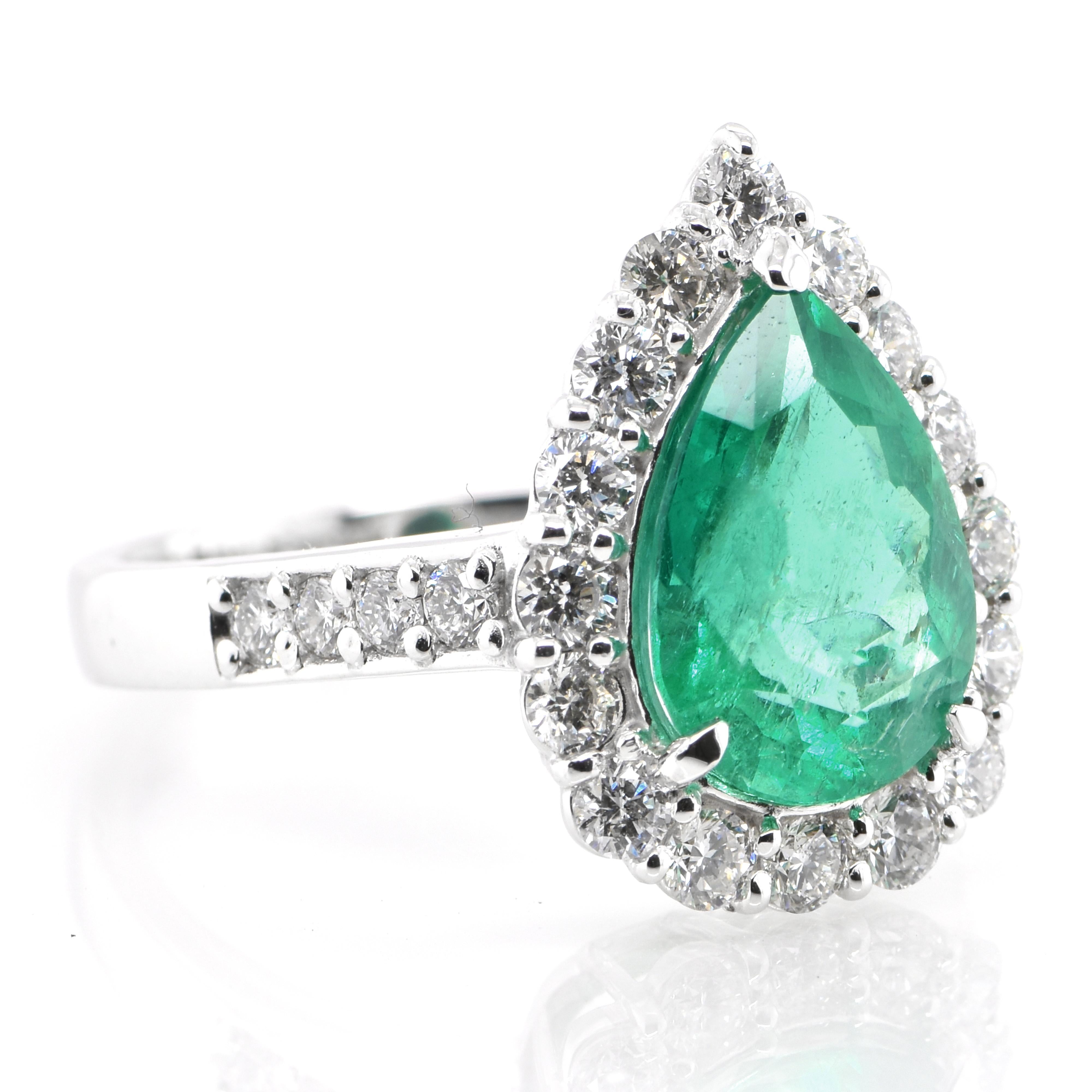 Modern 2.50 Carat Natural Pear-Cut Emerald and Diamond Ring Set in Platinum
