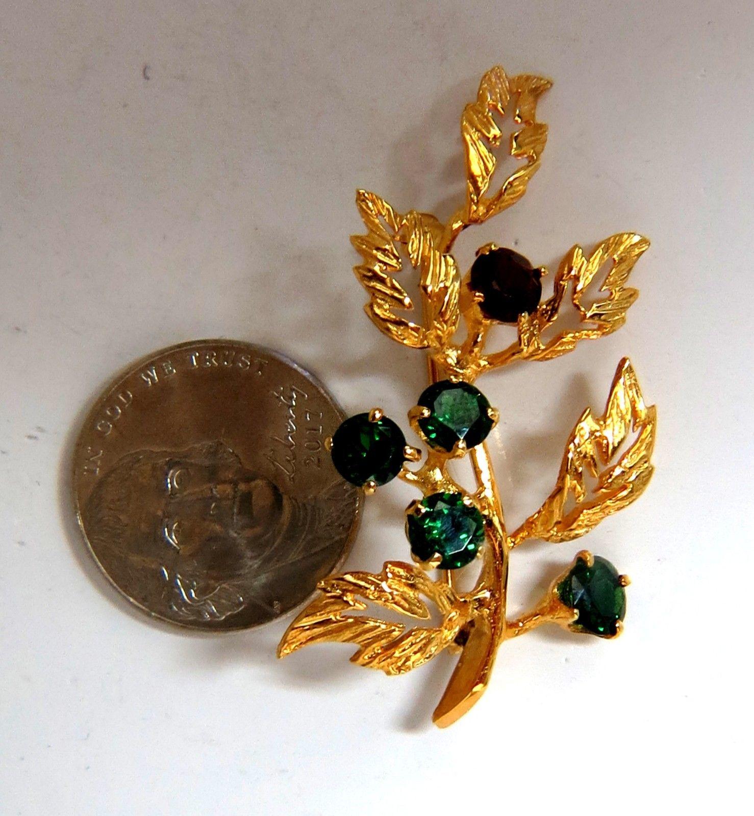 3D Blossom Branch Pin

  2.50ct. natural Tsavorite & Spessartite

14kt yellow gold 

5.8 grams.

Measures 1.7 x .9 inch 