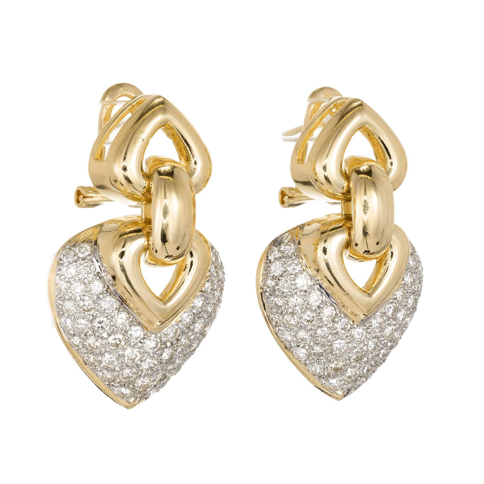 Classic vintage 1970s dangle diamond earrings in 18k yellow gold with white gold under bright white sparkly full cut diamonds. Excellent brilliance, movement and sparkle. Shield shape dangle.

102 round full cut diamonds, approx. total weight