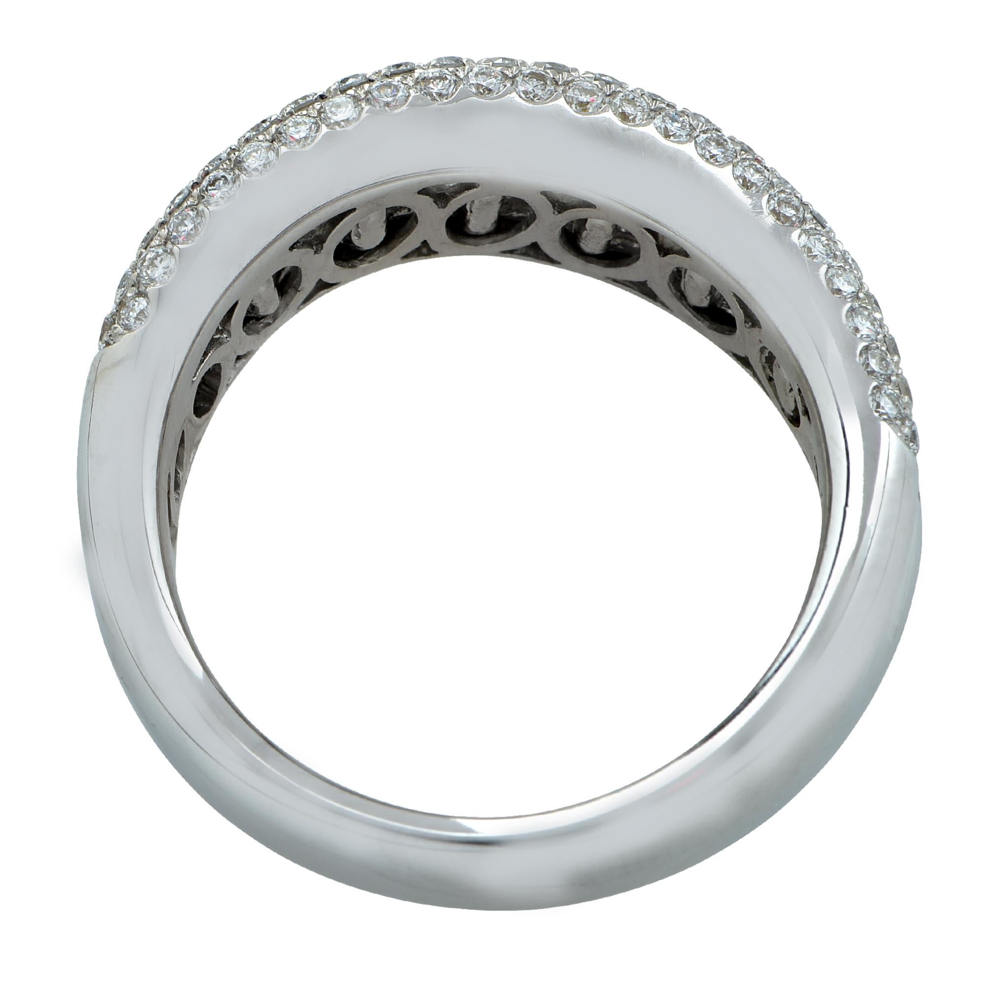 Stunning half eternity band featuring approximately 2.50cts  of mixed cut diamonds. This ring is adorned with 132 round brilliant diamonds, weighing approximately 1ct F-G color, VS clarity and 19 baguettes weighing approximately 1.50ct F-G color, VS