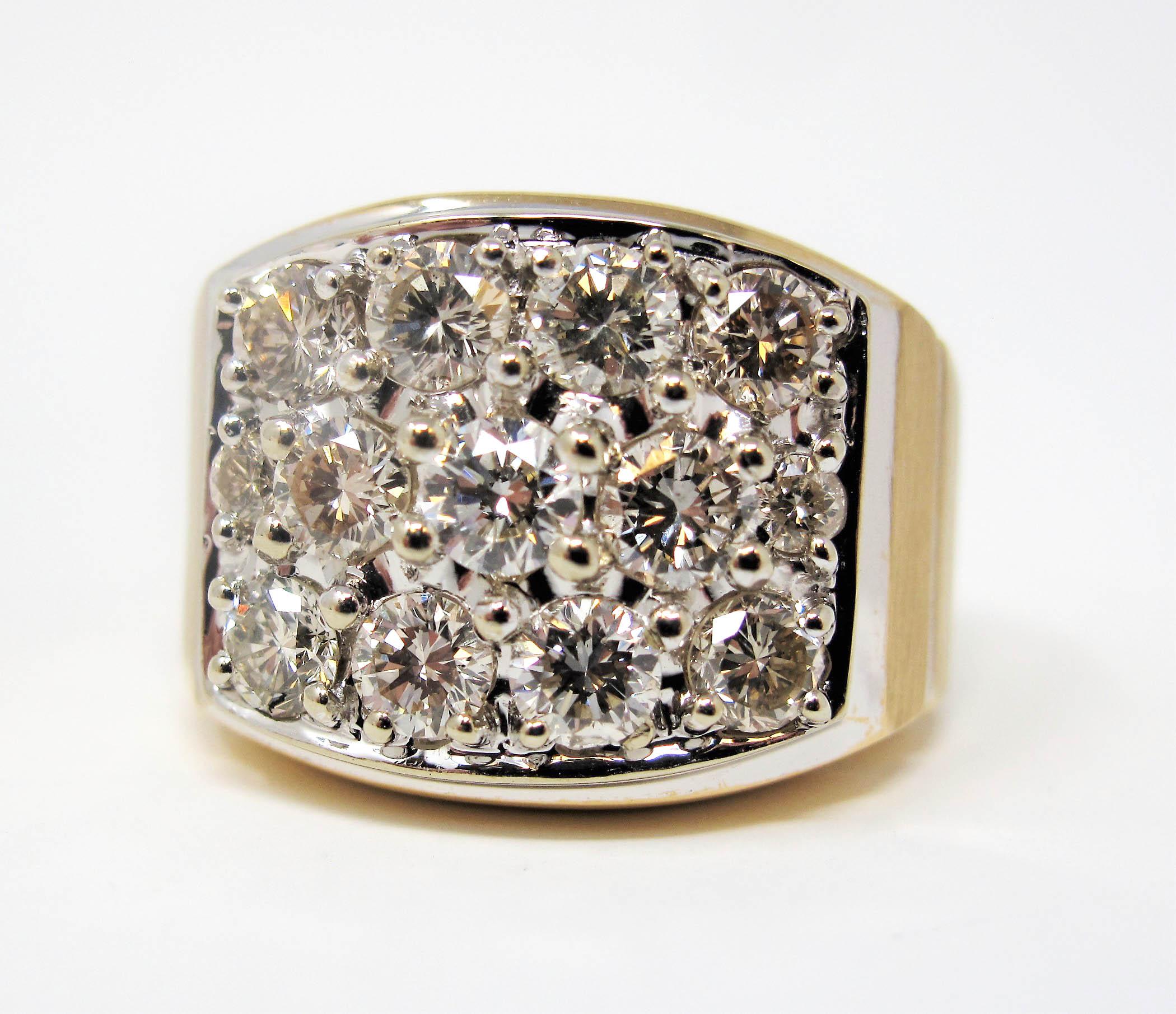 This bold, beautiful diamond band ring is absolutely bursting with sparkle! Featuring 3 horizontal rows of pave diamonds in a rectangular shaped setting, this multi-tone gold ring really fills the finger with dazzling brilliance. 

This incredible