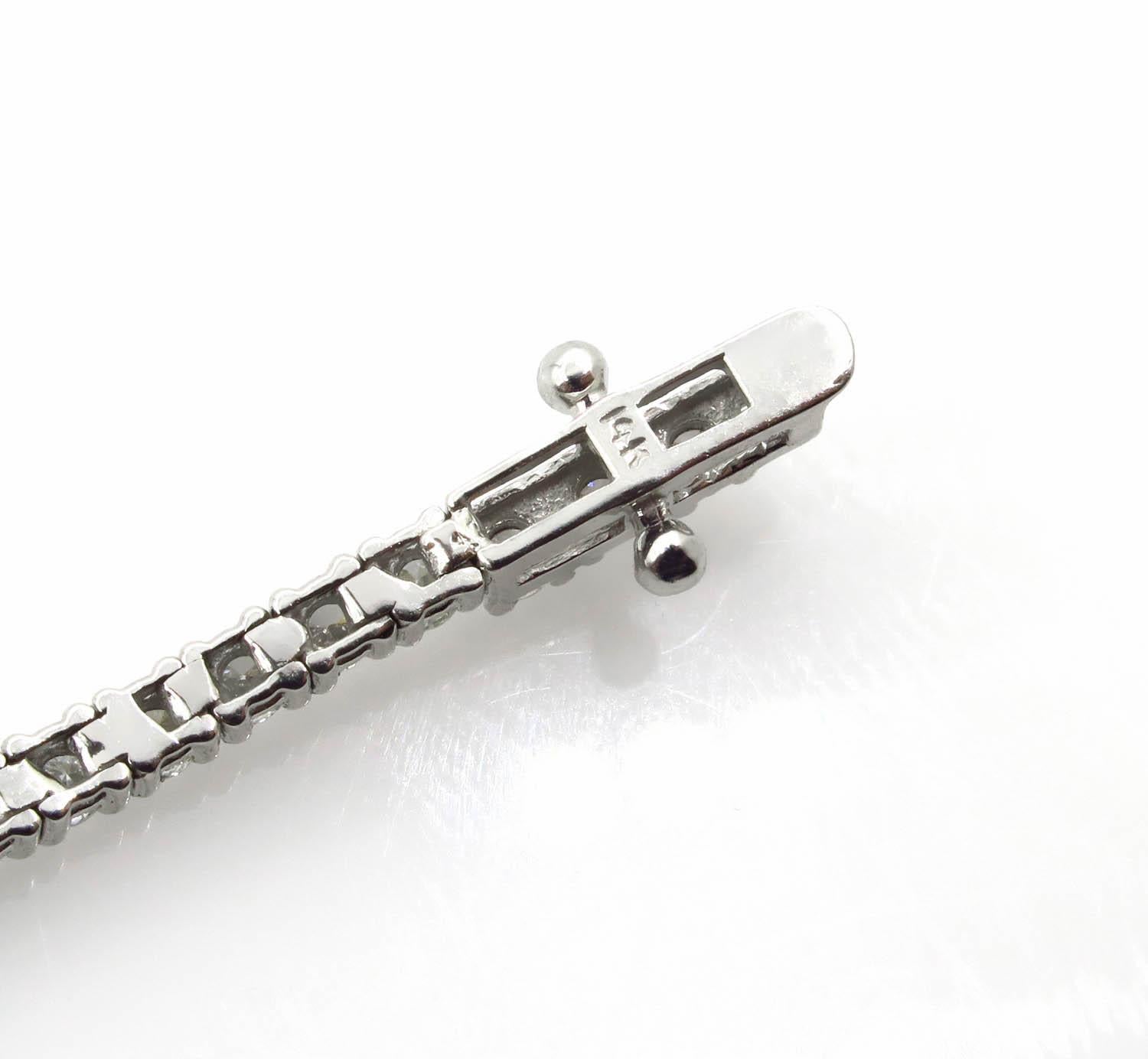 2.bracelet tennis avec diamants ronds de 50 carats en or blanc 10