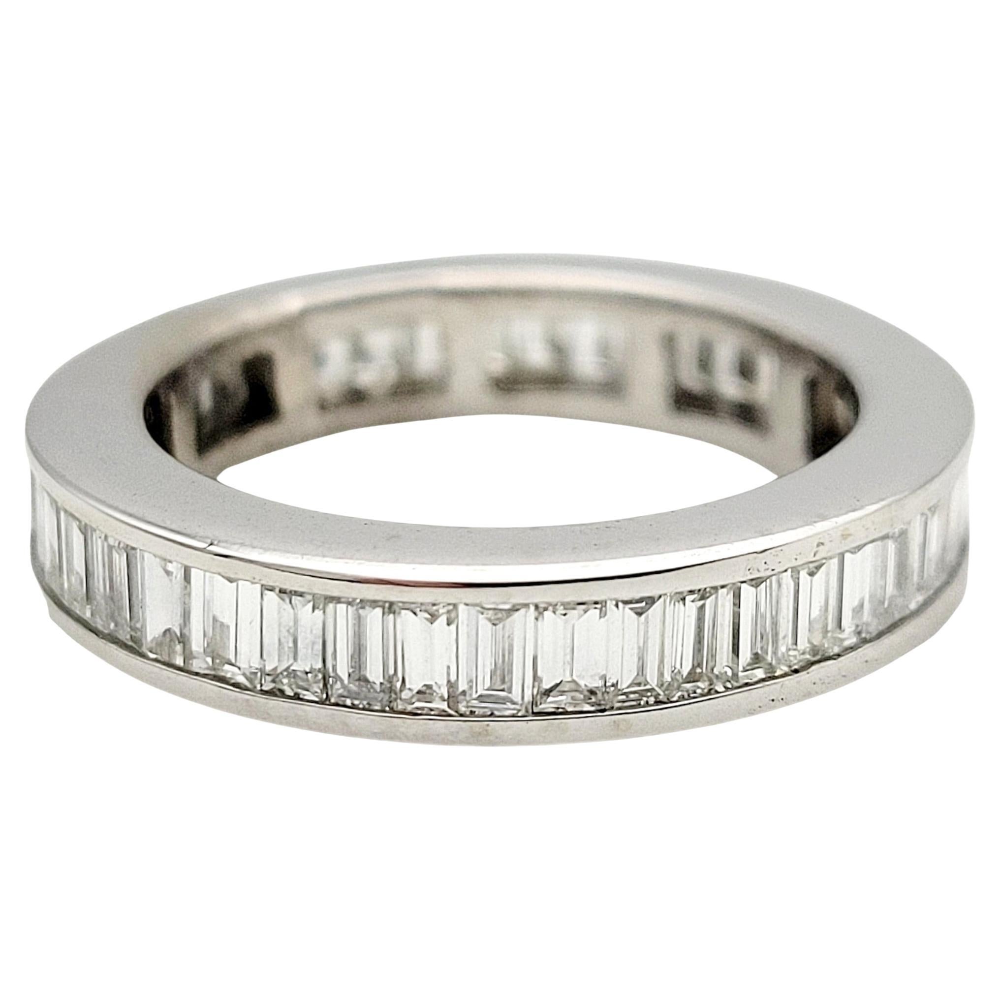Ring size: 5

Introducing an exquisite channel set baguette diamond eternity band ring in luxurious 14 karat white gold. This timeless piece redefines elegance, offering a seamless row of meticulously arranged baguette-cut diamonds that encircle the