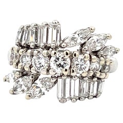 Retro 2.50 Carat Total Weight Platinum Ring With Round, Marquise, And Baguette Diamond