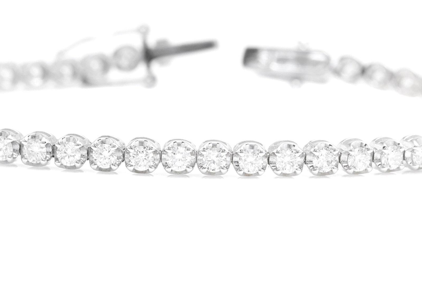 2.50 Carats Stunning Natural Diamond 14K Solid White Gold Bracelet 

Suggested Replacement Value: Approx. $6,000.00

STAMPED: 14K

Total Natural Round Diamonds Weight: Approx. 2.50 Carats (color G-H / Clarity SI1-SI2)

Bangle Wrist Size is:  7