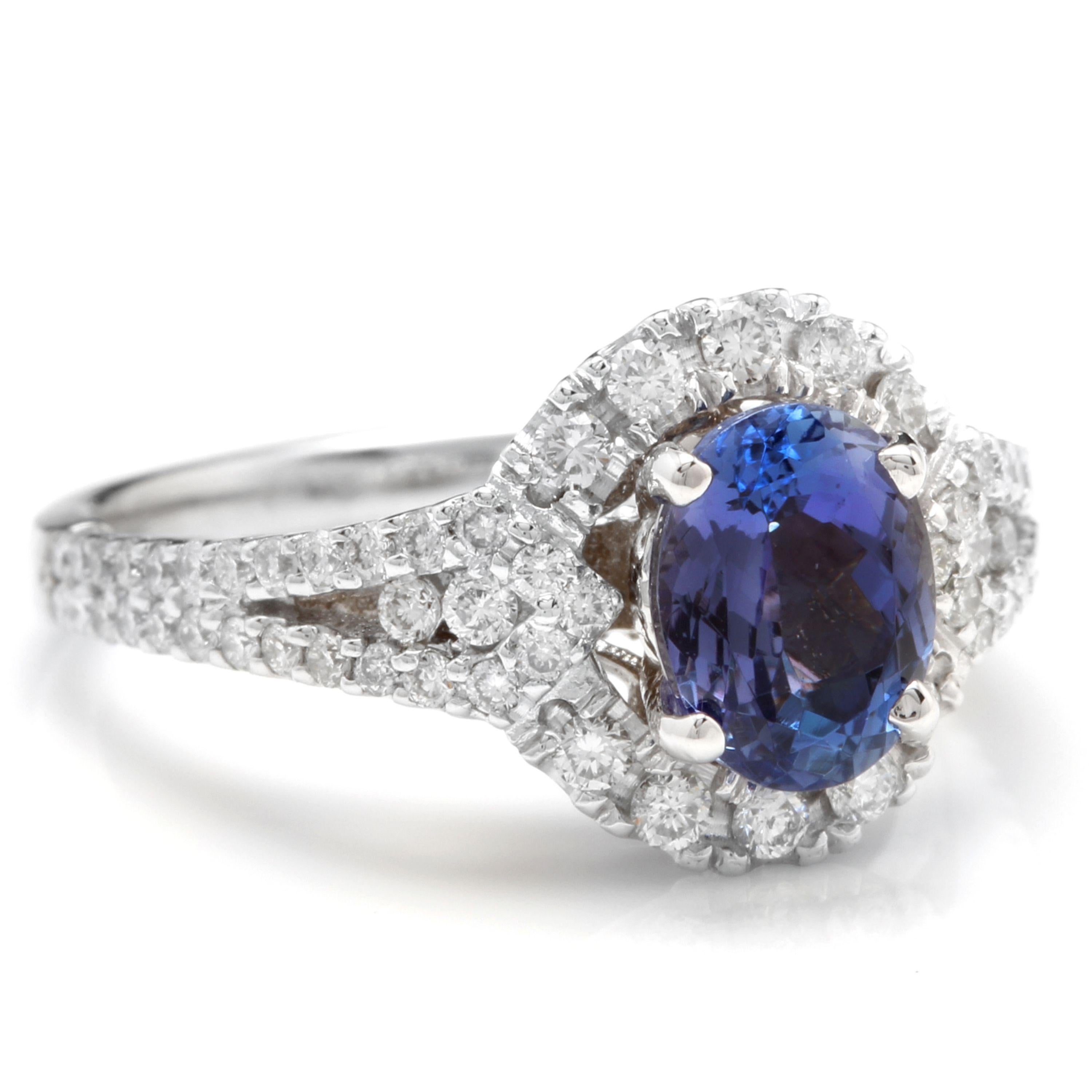 2.50 Carats Natural Very Nice Looking Tanzanite and Diamond 14K Solid White Gold Ring

Total Natural Oval Cut Tanzanite Weight is: Approx. 1.70 Carats

Tanzanite Measures: Approx. 8.00 x 6.00mm

Natural Round Diamonds Weight: Approx. 0.80 Carats