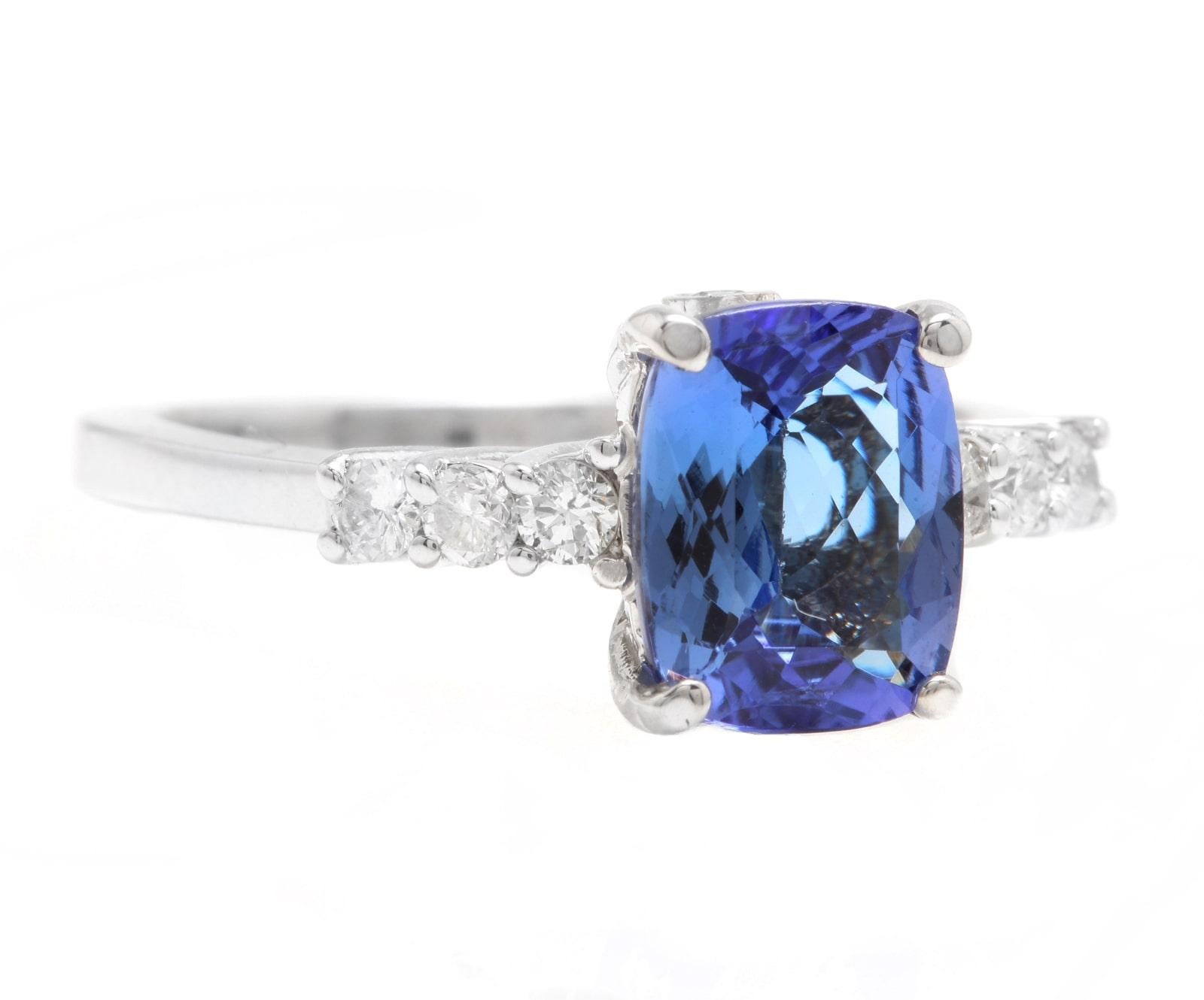 2.50 Carats Natural Very Nice Looking Tanzanite and Diamond 14K Solid White Gold Ring

Suggested Replacement Value:  $4,000.00

Total Natural Cushion Tanzanite Weight is: Approx. 2.15 Carats 

Tanzanite Measures Approx. 9 x 7mm

Natural Round
