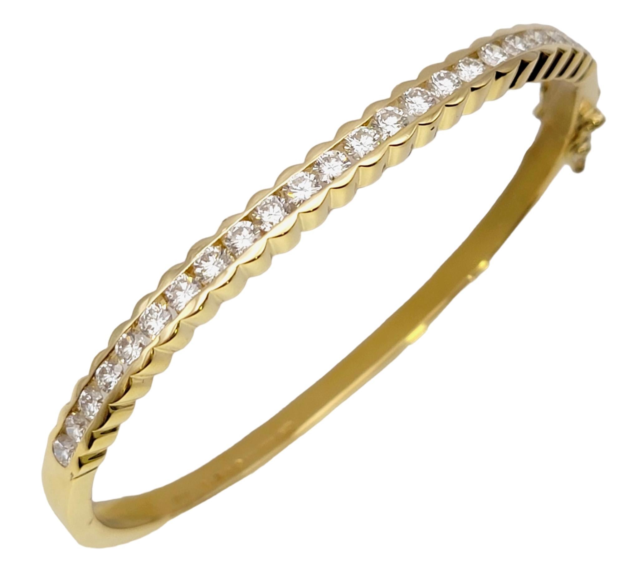Gorgeous bangle bracelet with scalloped edges and a dazzling diamond detail. The classically designed bangle will wrap your wrist with elegance and give a sophisticated look that you will simply love.   

This beautiful bangle is made of luxurious