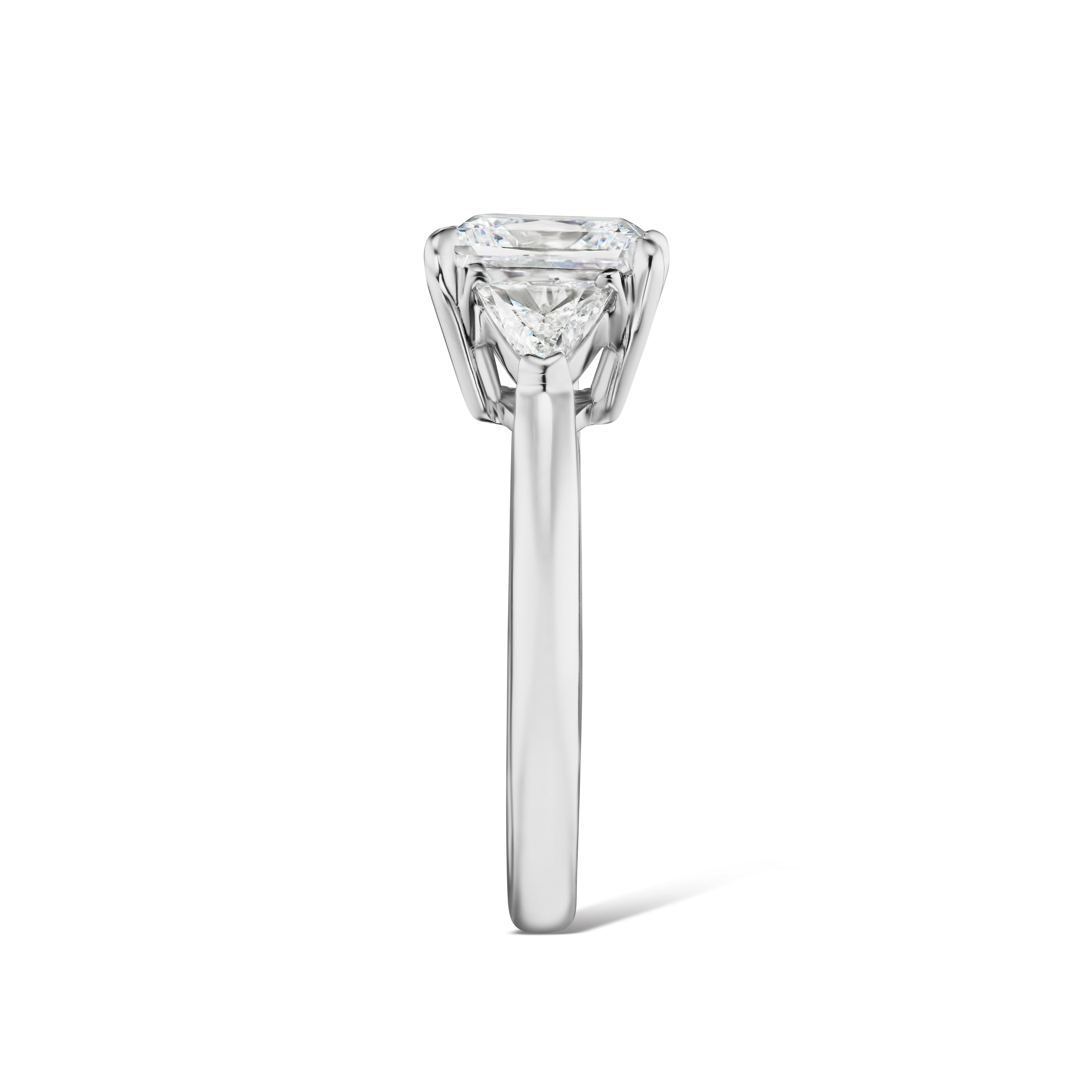 This stunning 2.50 DSI1 GIA Certified stone is enriched by a pair of .57 ct. total weight of matching Trillion Cut side stones in a elegant Platinum ring. It is a size 8 and can easily be sized.  If you don't see something, say something! We would