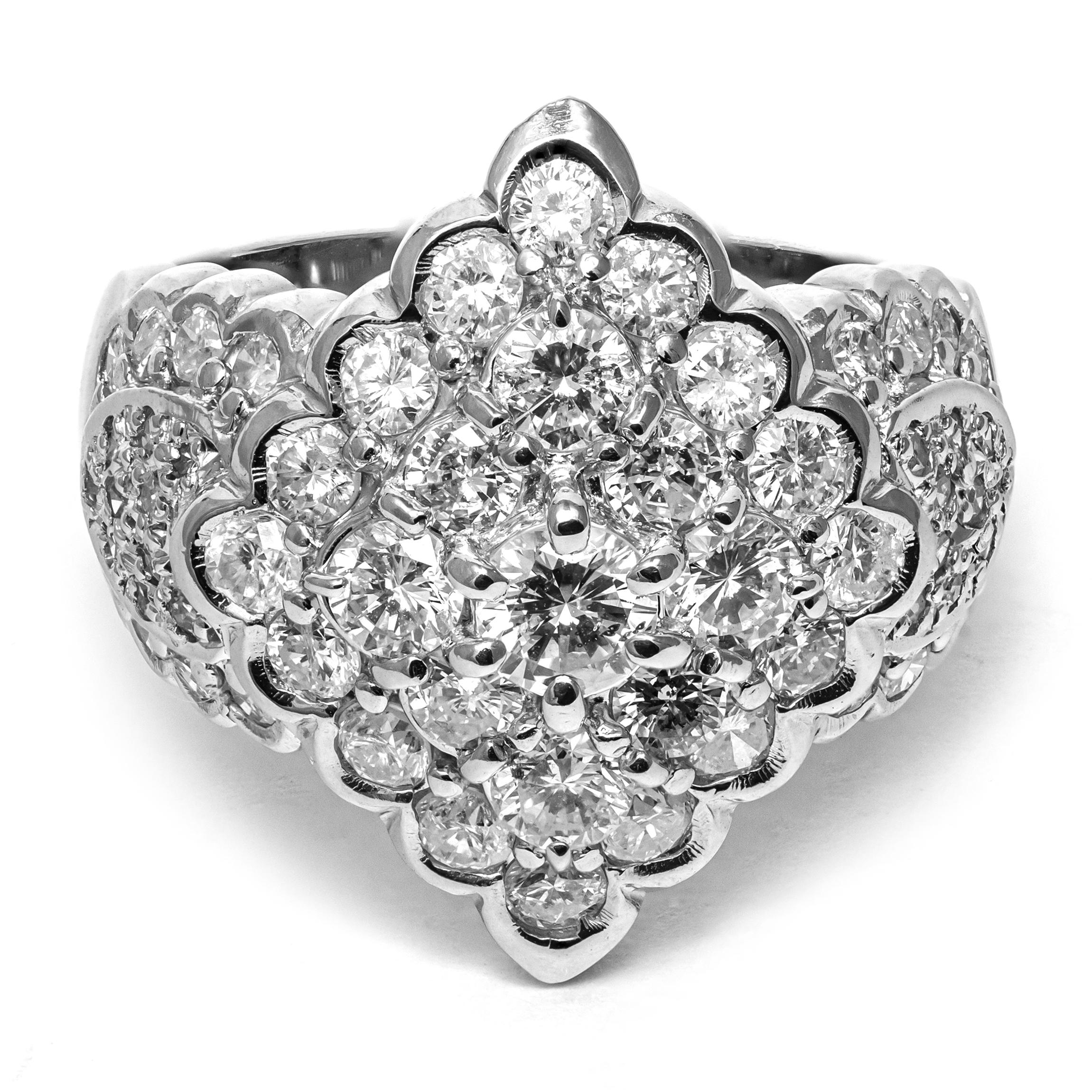 Precious 2.50 ct cluster Ring of Round Brilliant Cut Natural White Diamonds set at the center of a platinum rhombus frame.
