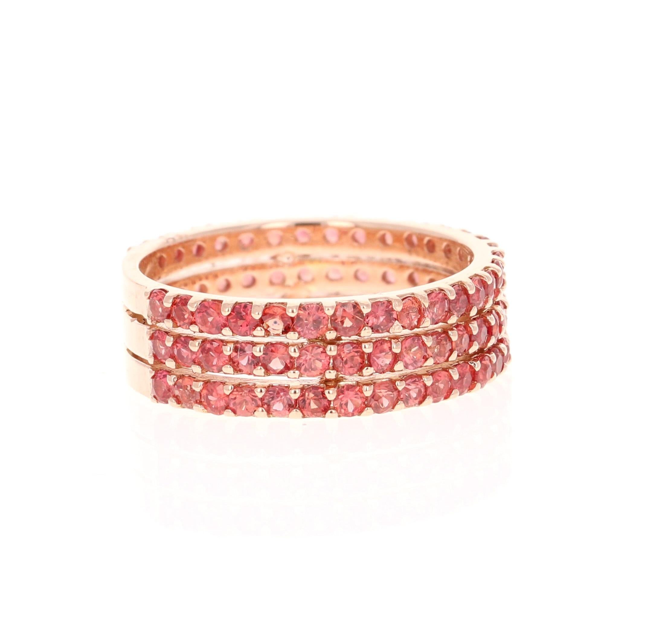 This ring has 90 Natural Round Cut Red Sapphires that weigh 2.50 Carats. 

Crafted in 14 Karat Rose Gold and weighs approximately 4.4 grams 

The ring is a size 7 and can be re-sized at no additional charge!