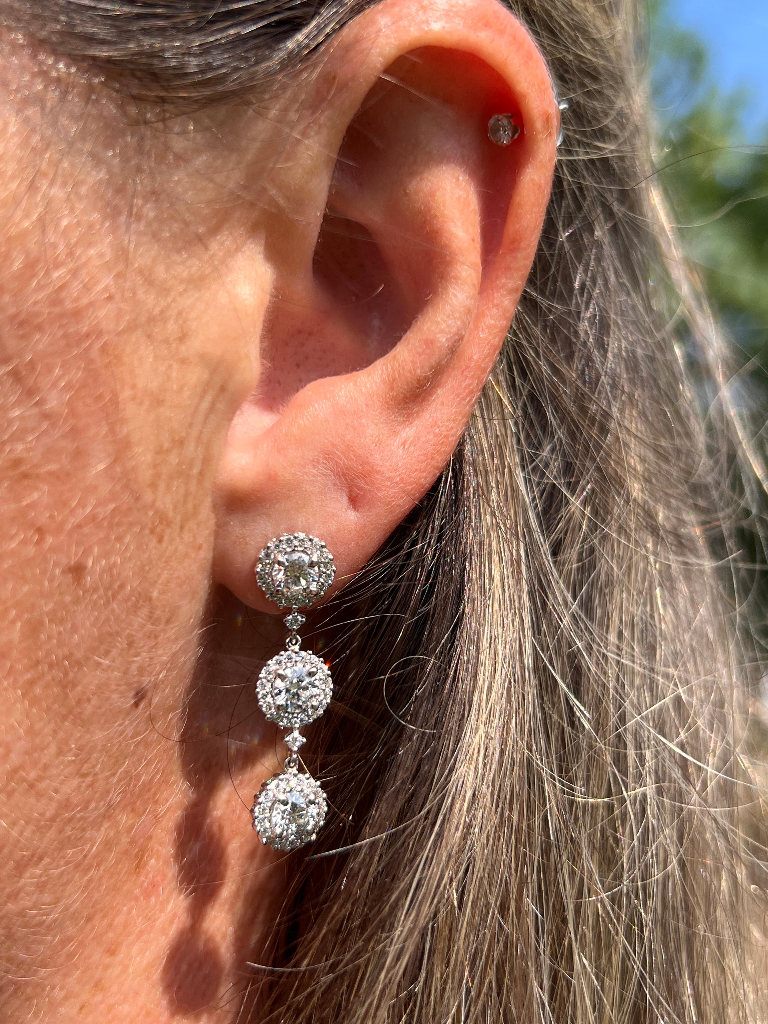 Contemporary 2.50 TCW Diamond and 14k White Gold Halo Drop Earrings For Sale