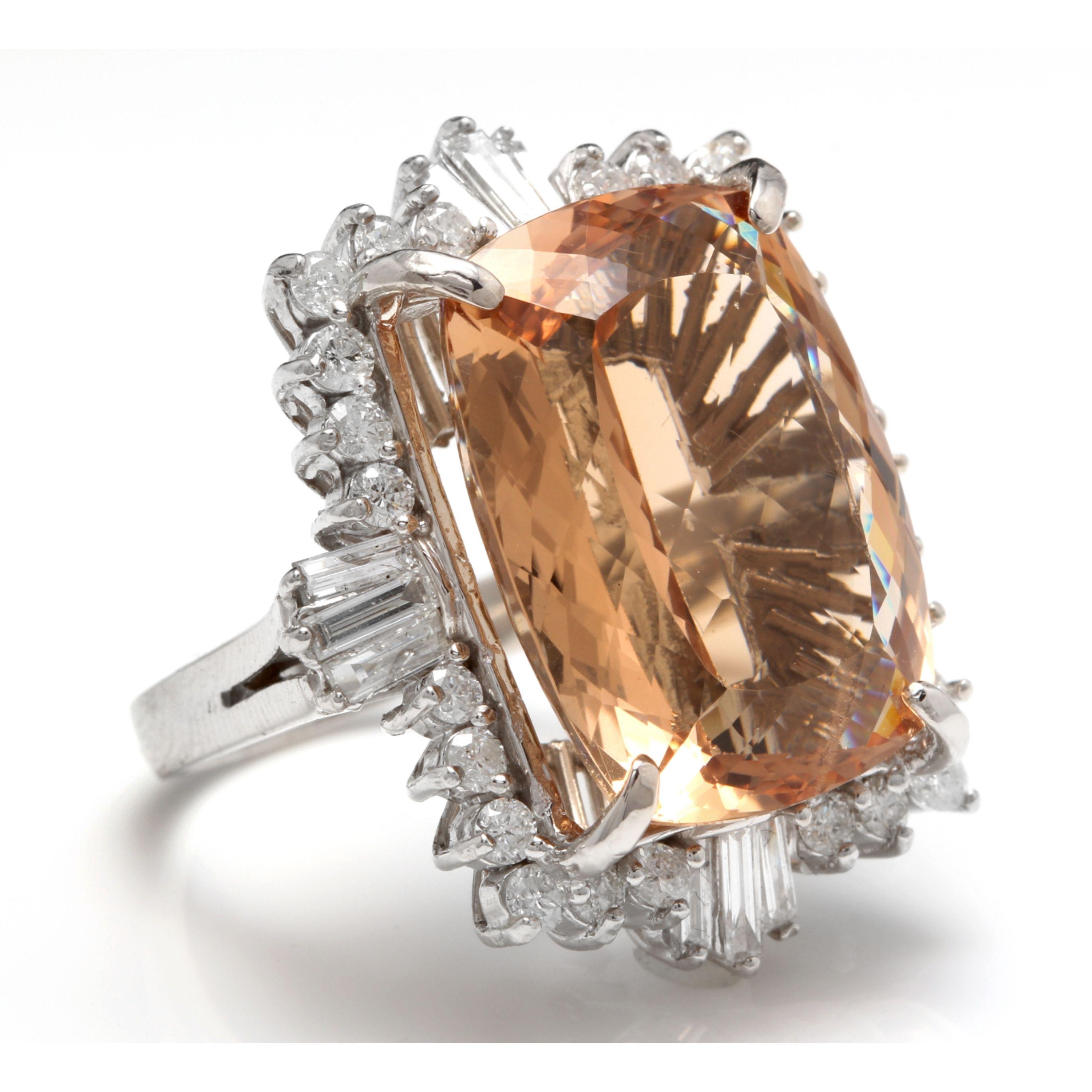 25.00 Carats Impressive Natural Morganite and Diamond 14K Solid White Gold Ring

Total Morganite Weight is: Approx. 23.00 Carats

Morganite Treatment: Heating

Morganite Measures: Approx. 20.00 x 16.00mm

Natural Round & Baguette Diamonds Weight: