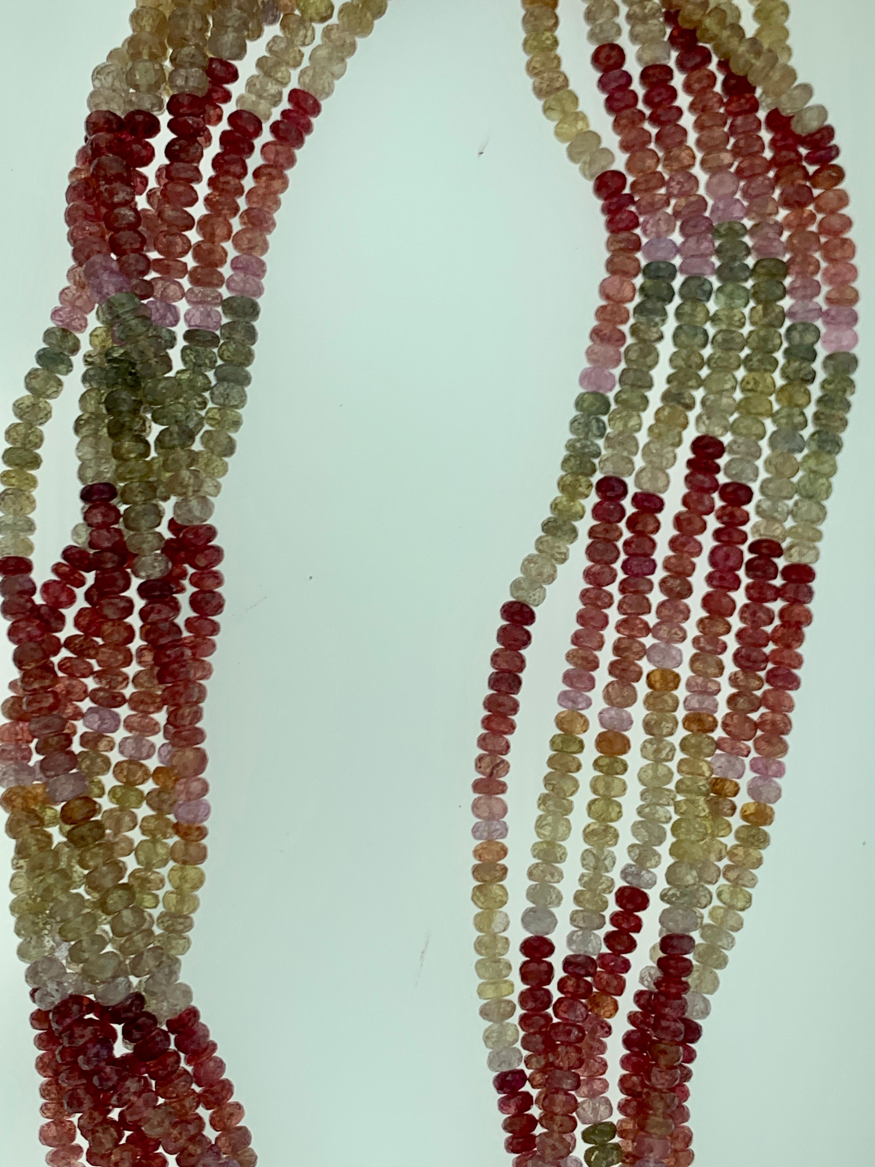  2500 Ct  7 Layer Natural Multi Sapphire Fine Bead Necklace 18 Karat White  Gold  Clasp
This spectacular Necklace   consisting of approximately 2500 Ct   of  Fine Multi Sapphire  Beads.
Colors are different shades of pink , Green , Brown
Amazing