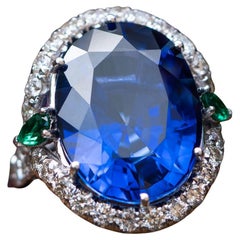 25.00 Ct Oval Sapphire Ring, 0.30 Natural Emeralds, 1.10 Carat Natural Diamonds
