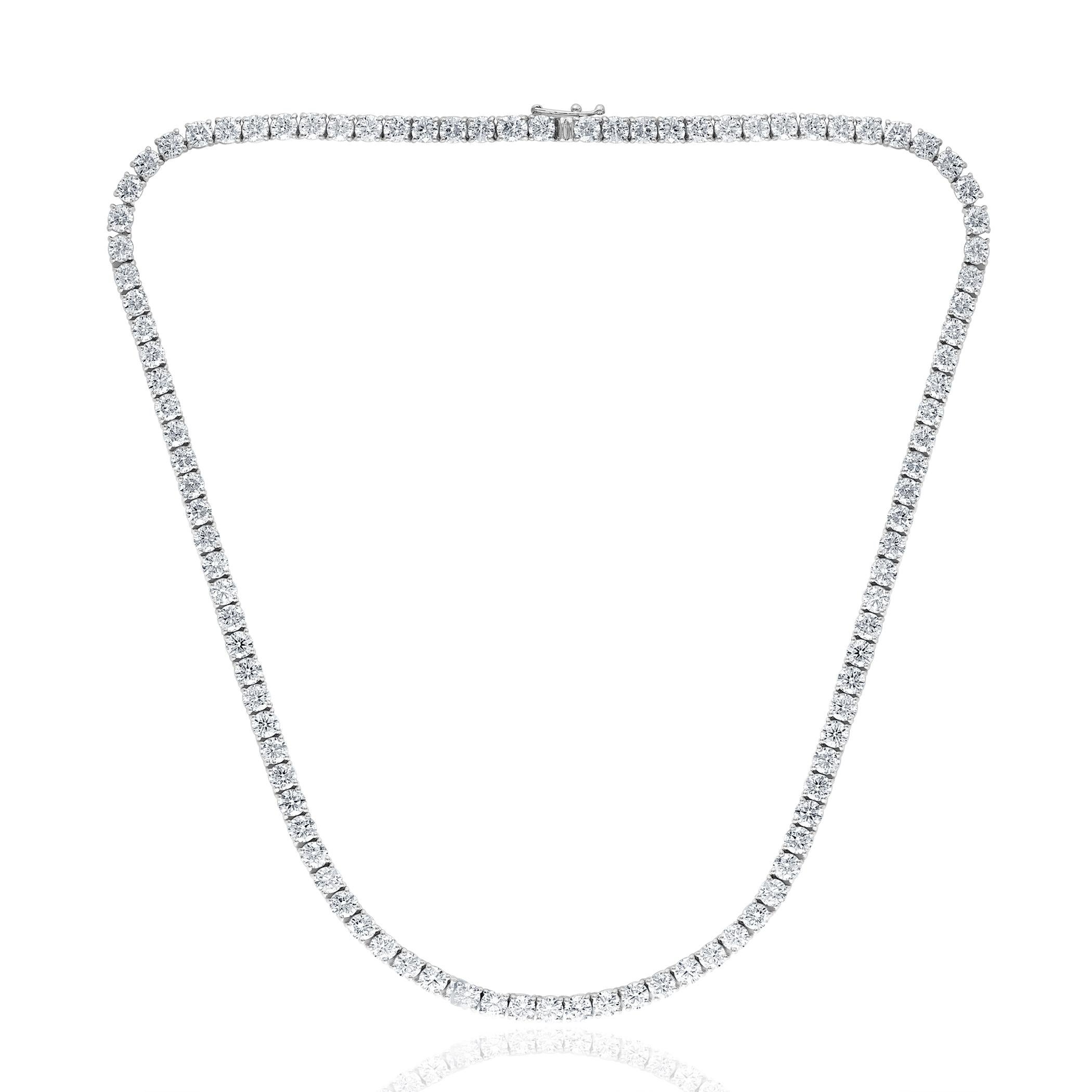 A brilliant and classic piece showcasing a line of round diamonds set in 14K White Gold. 103 diamonds in this necklace are brilliant round cut and weigh 25.03 carats in total. 16 inches in length.