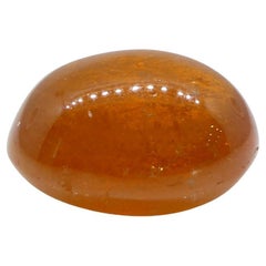 Garnet spessartine orange cabochon ovale de 25.06 carats du Nigeria