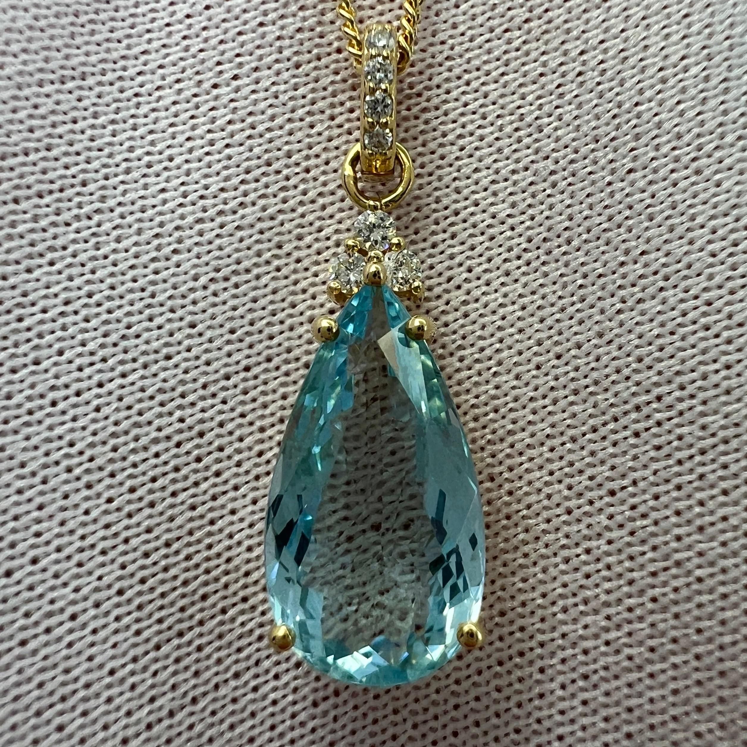 Natural Blue Aquamarine And Diamond 18k Yellow Gold Pendant Necklace.

2.50 Carat aquamarine with a stunning vivid blue colour and an excellent pear teardrop cut showing lots of brightness and light return. Also has excellent clarity, a very clean