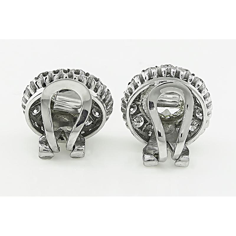 2.50 Carat Center Diamond 1.50 Carat Side Diamond Earrings In Good Condition In New York, NY