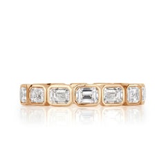 2.50ct Emerald Cut Diamond Eternity Band in 18k Champagne Yellow Gold