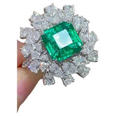 2.50ct Emerald Ring with 2.73ct Diamond Halo in 18K White Gold