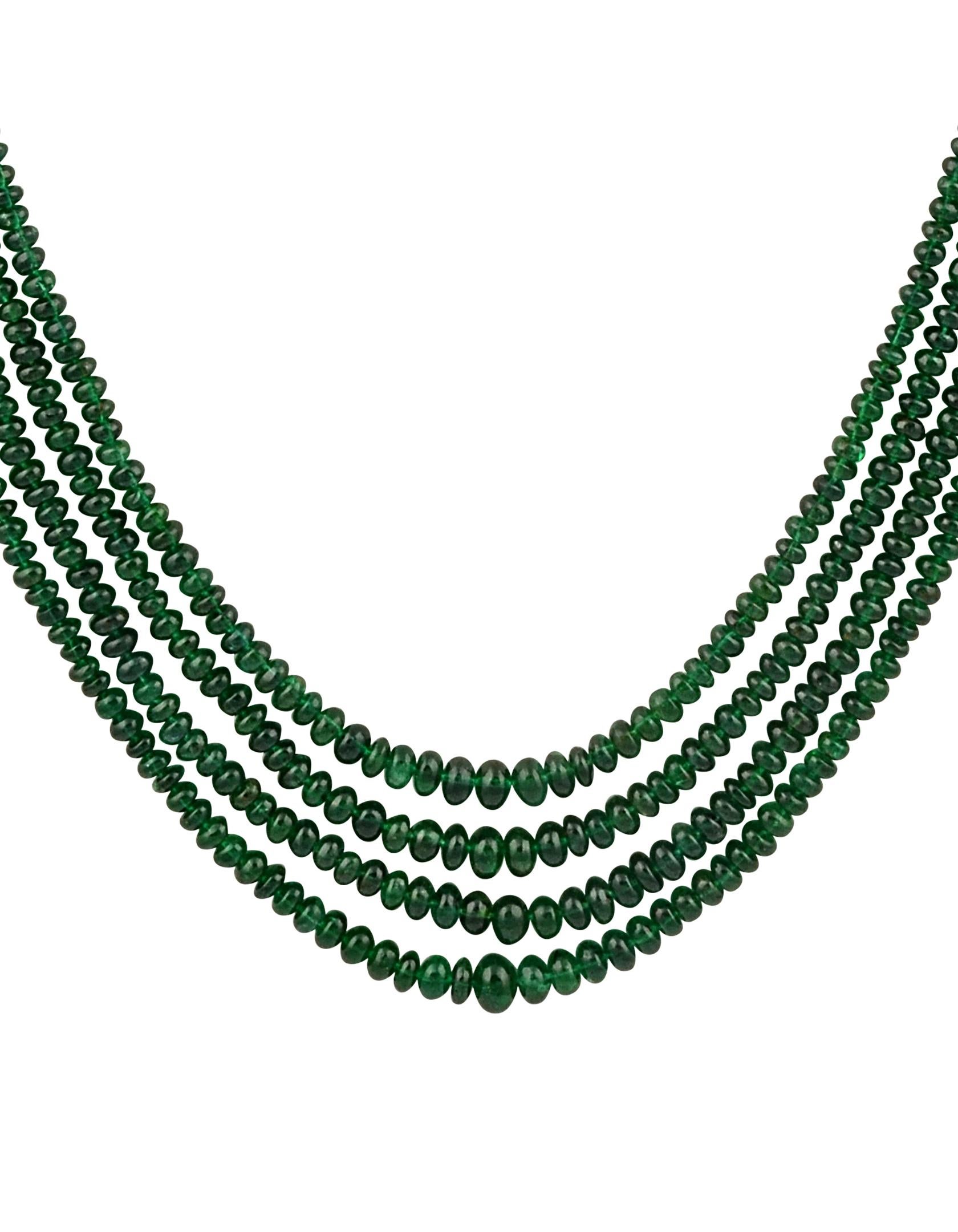 Approximately 250 Carat  very fine Emerald Beads 4 Line Necklace With 14 Karat Yellow Gold Clasp Adjustable with multiple links
This spectacular Necklace   consisting of approximately 250 Ct  of fine beads.
The shine sparkle and brilliance with deep