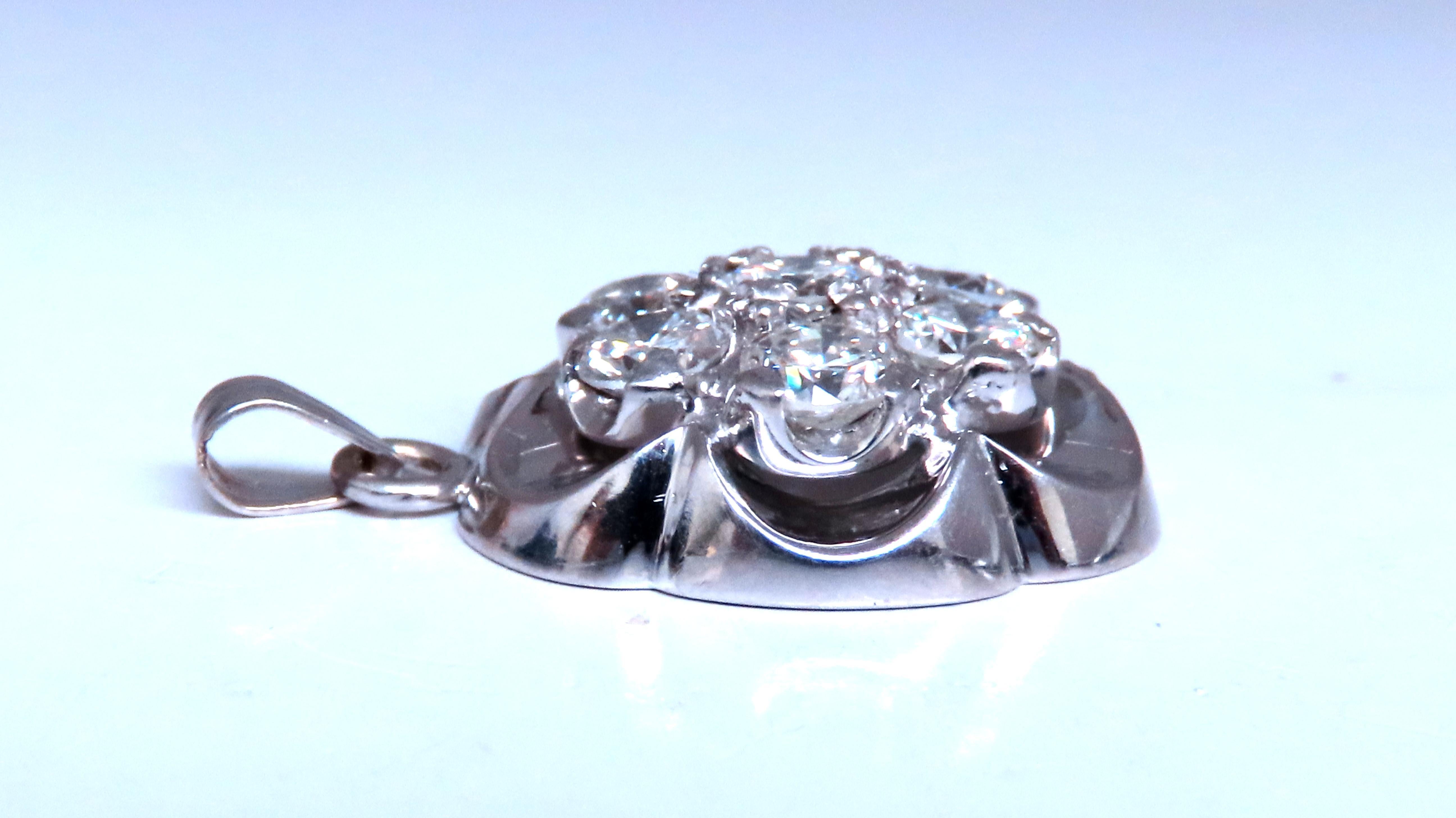 2.50ct Natural Diamonds Large Cluster pendant.
G-H color Si-1 Si-2 clarity.
14kt. white gold.
9 grams
20mm diameter

$12000 Appraisal to accompany