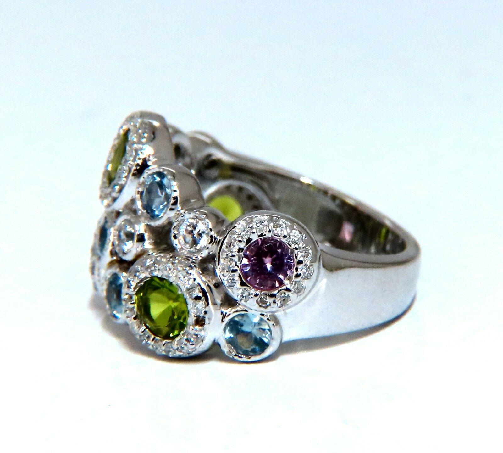 Peridot, Pink Sapphire and Aquamarine Bubbles Ring

Round Brilliant cut, Excellent VS Clean Clarity

Totaling 2.50ct.

.50ct Diamonds: G-color Vs-2 clairty.

13.8mm wide

14kt. white gold

8.9 grams.

Depth of ring: 3.7mm

current ring size: 5.5