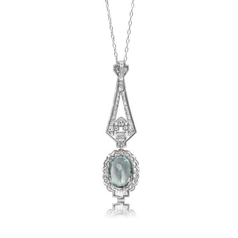 Indulge in the captivating allure of this elongated platinum pendant, a true embodiment of elegance and grace. At its heart lies a mesmerizing oval-cut natural aquamarine, weighing approximately 2.5 carats, securely nestled within a delicate bezel