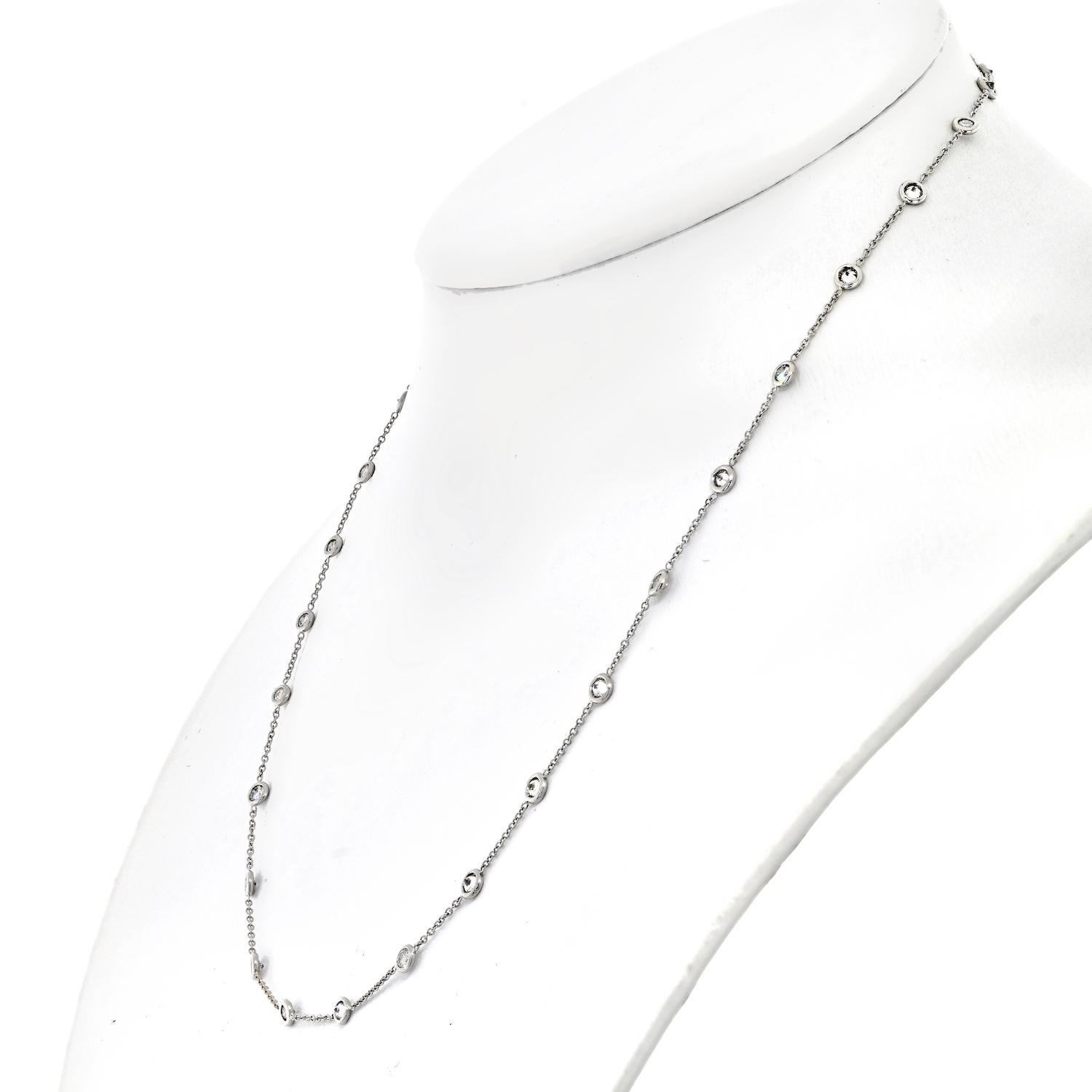 The delicate Diamond by the Yard necklace is a stunning piece of jewelry that is sure to turn heads. With a total carat weight of 2.50cttw, the necklace boasts 31 round diamonds that are beautifully set to catch the light from every angle. The