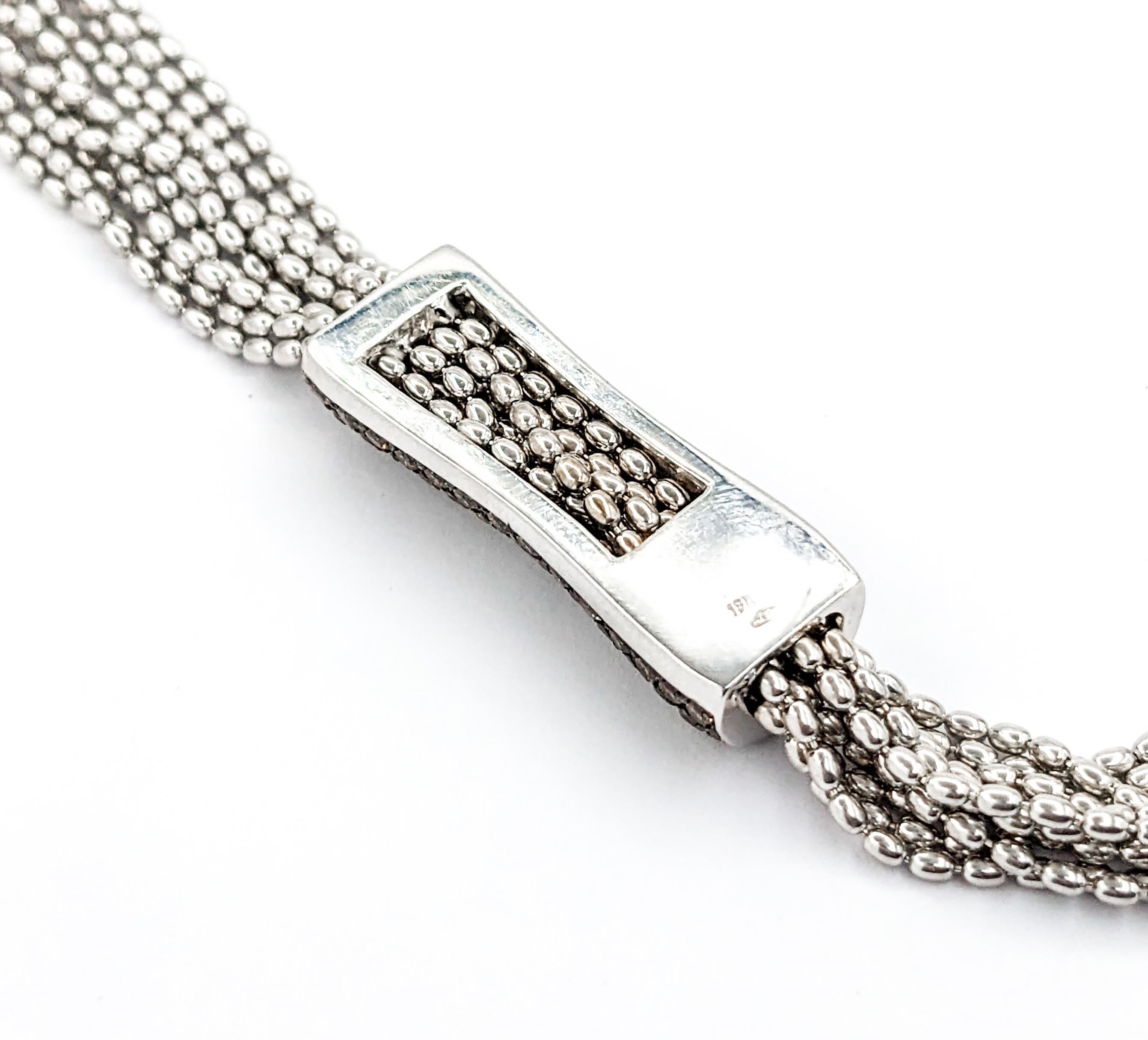 2.50ctw Diamond 5 Strand Mock Bolo design In White Gold

Voici l'exquis collier Diamond Fashion, doté d'un design Mock Bolo à 5 brins, méticuleusement réalisé en or blanc 18kt. Cette chaîne luxueuse est ornée de 2,50ctw de diamants, dont des