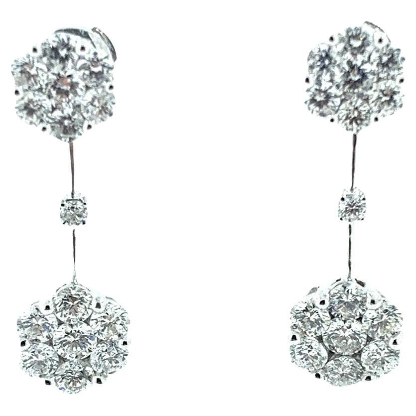 These drop earrings are a dazzling expression of luxury and elegance, carefully crafted in 18K white gold. Each earring features a cascade of diamonds, totaling 2.51 carats, that catch the light and sparkle with unmatched brilliance.

The design of