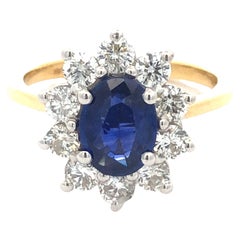 2.51 Carat Oval Blue Sapphire Round Diamond Hasbani 18Kt Halo Engagement Ring
