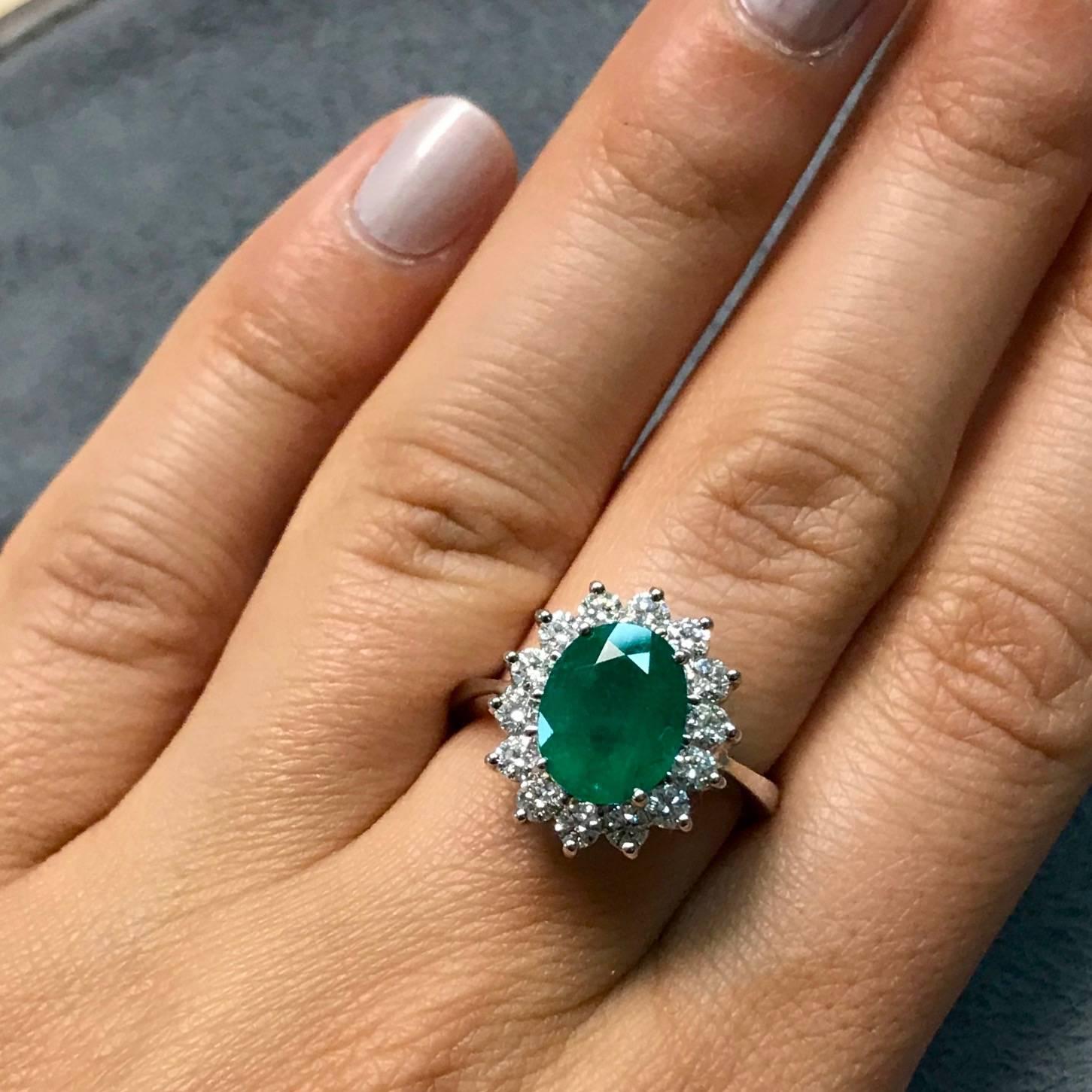 Material: 14k White Gold
Gemstones: 1 Oval Emerald at 2.51  Carats.
Diamonds: Brilliant Round White Diamonds at 0.80 Carats. SI Clarity / H-I Color. 
Ring Size: 6.25 (Can be sized)

Fine one-of-a kind craftsmanship meets incredible quality in this