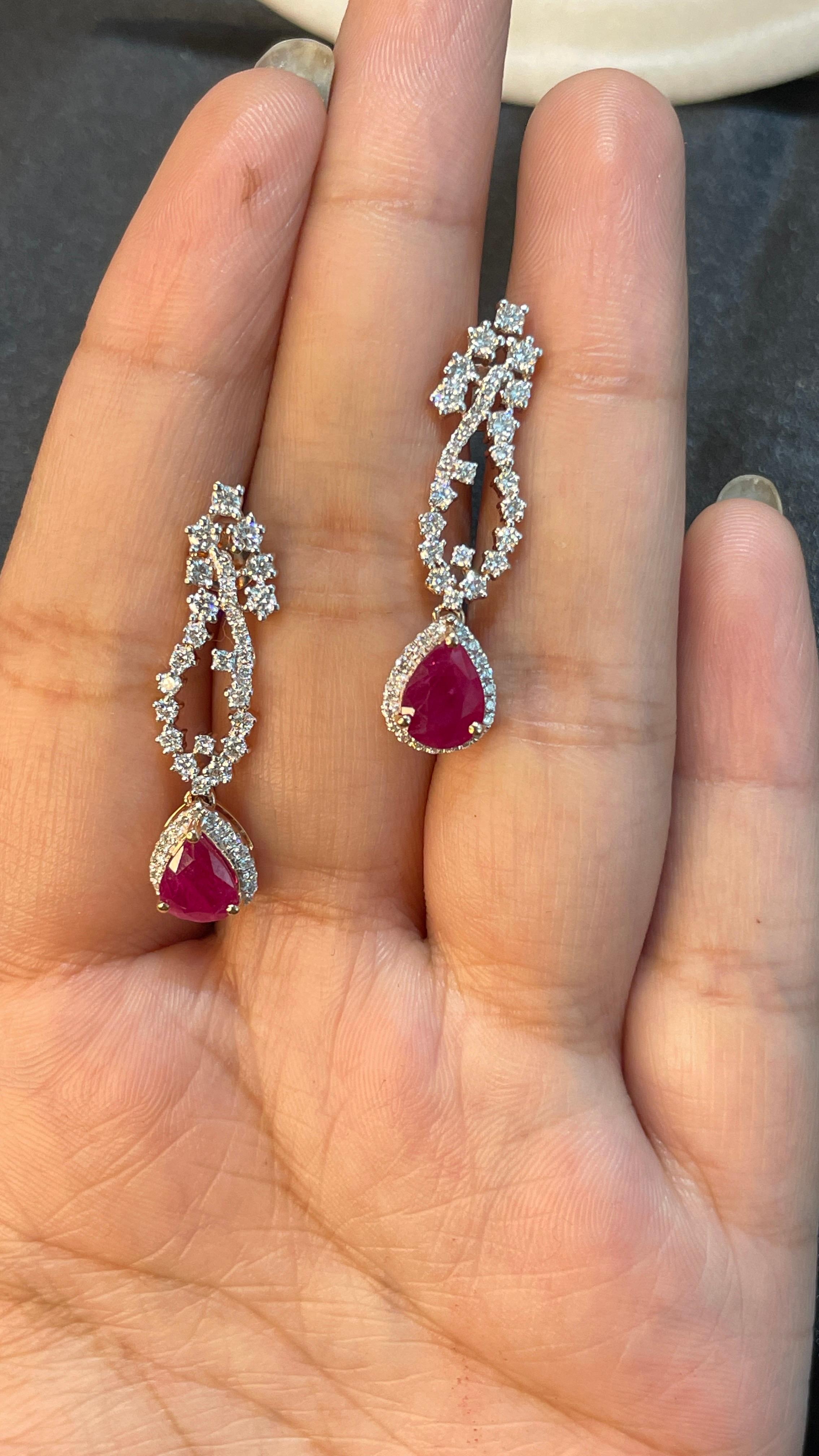 Ruby Dangle earrings to make a statement with your look. These earrings create a sparkling, luxurious look featuring pear cut gemstone.
If you love to gravitate towards unique styles, this piece of jewelry is perfect for you.

PRODUCT DETAILS :-

>